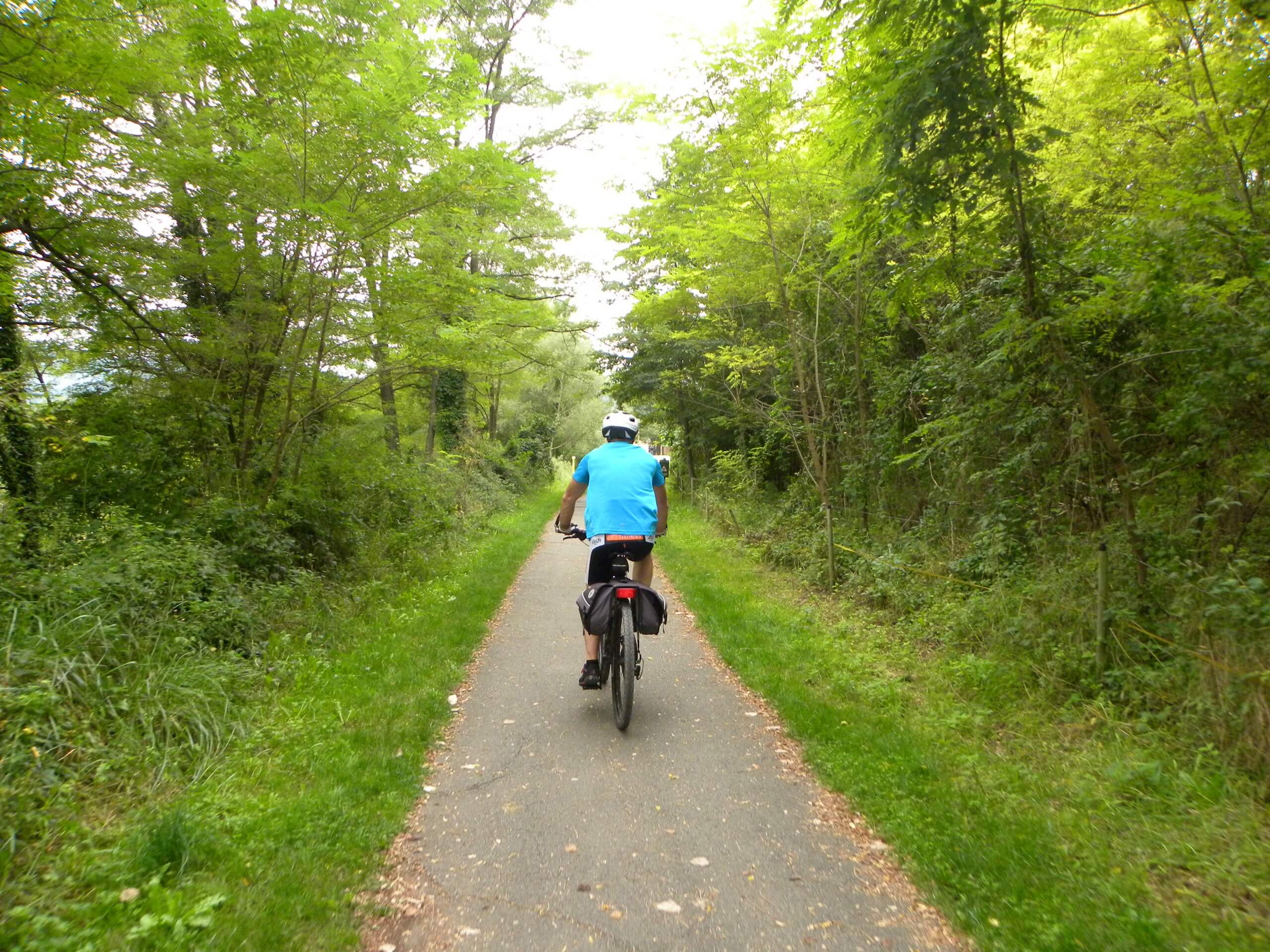 Biker riding the green path in Costa Brava