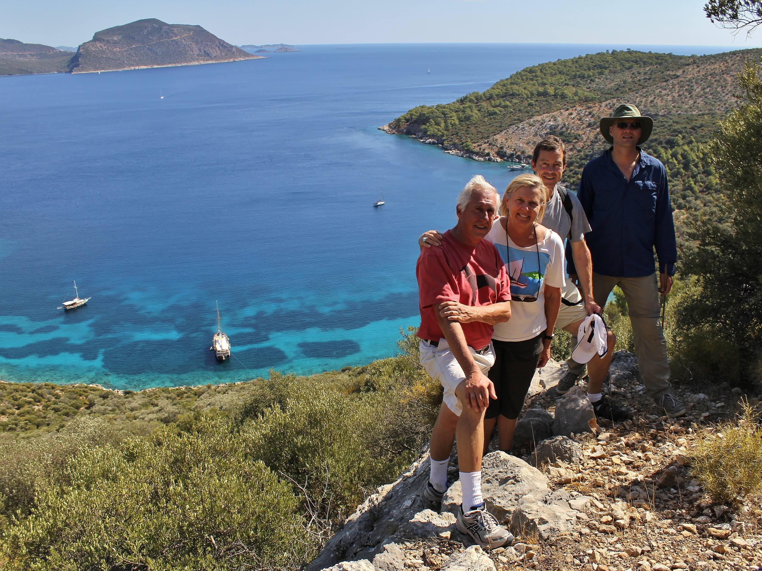 Group of trekkers hiking along the shores of Lykian coast