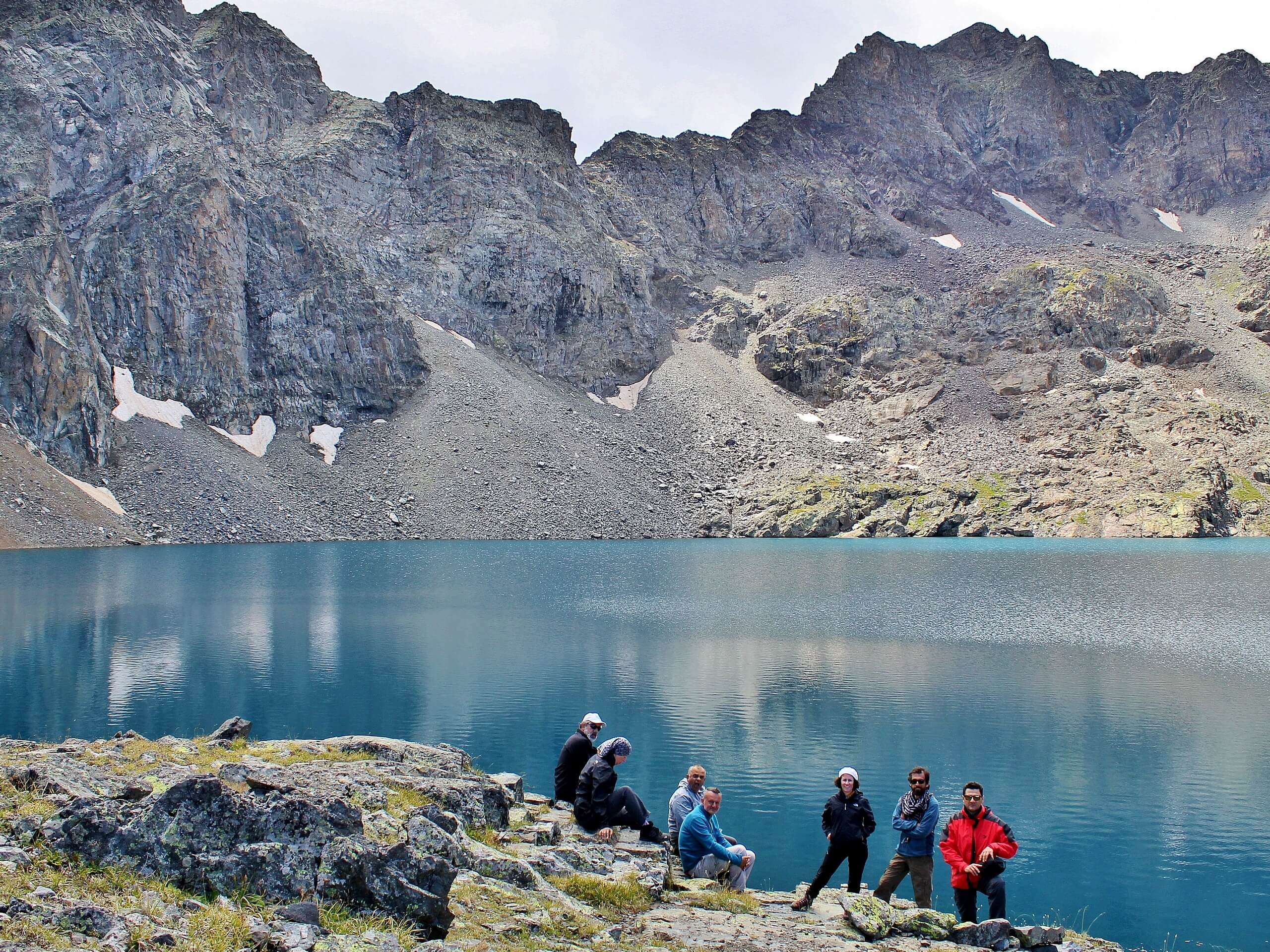 Group of trekkers near bule lake in Kackar Mountains, Turkey