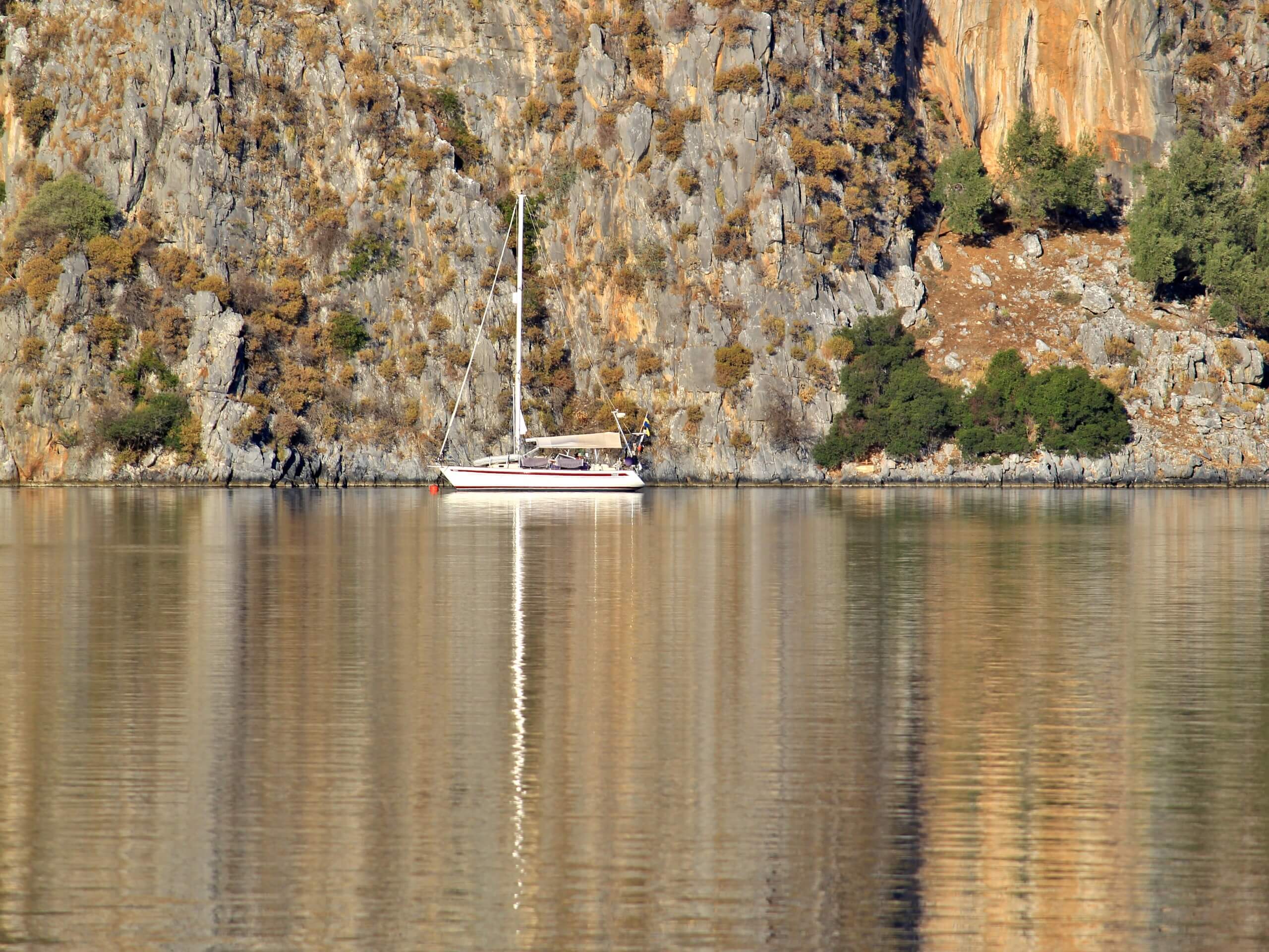 Gulet near the rocky shores of Turkey