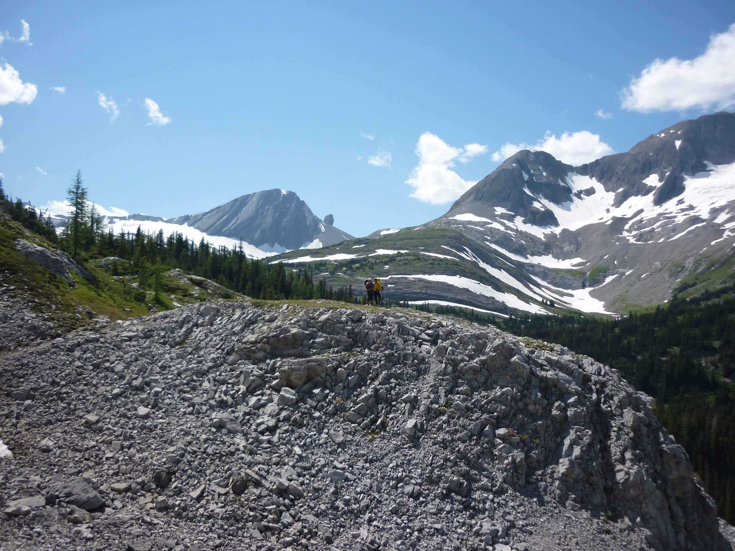 Hikers posing on top of the mountain