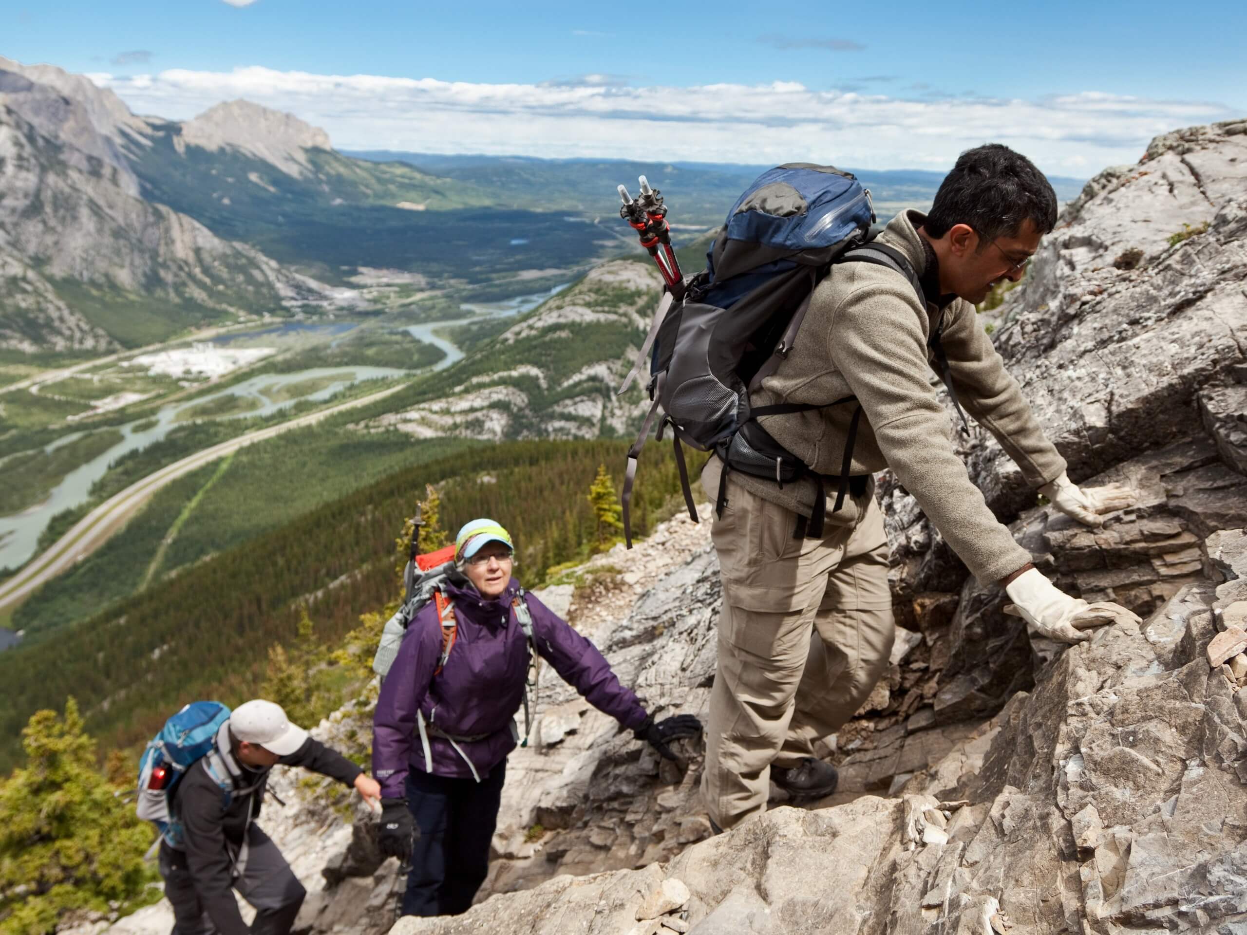 Group of scramblers ascending to the top of the peak