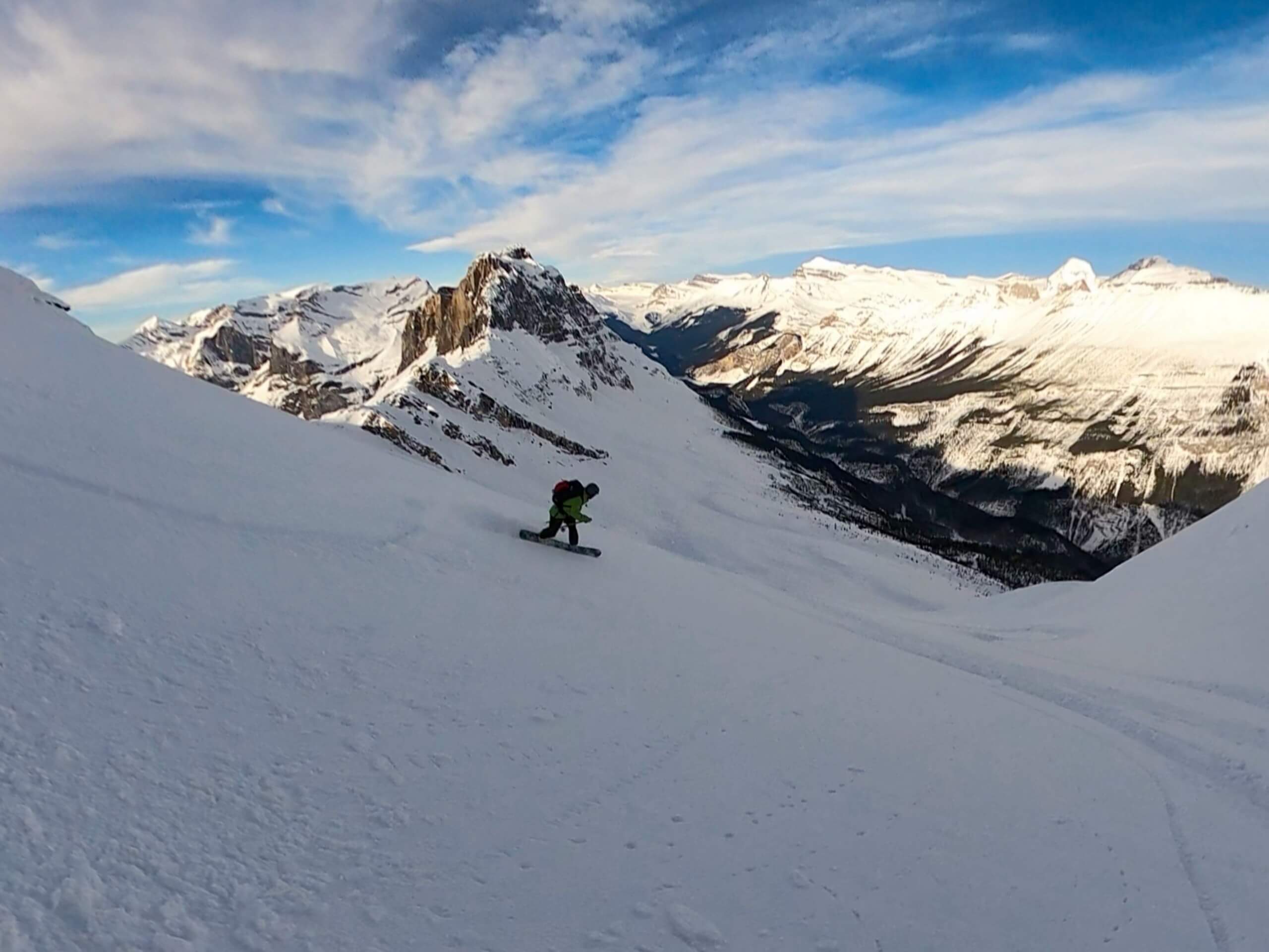 Snowboarding in the Canadian Rocky Mountains while on avalanche training course