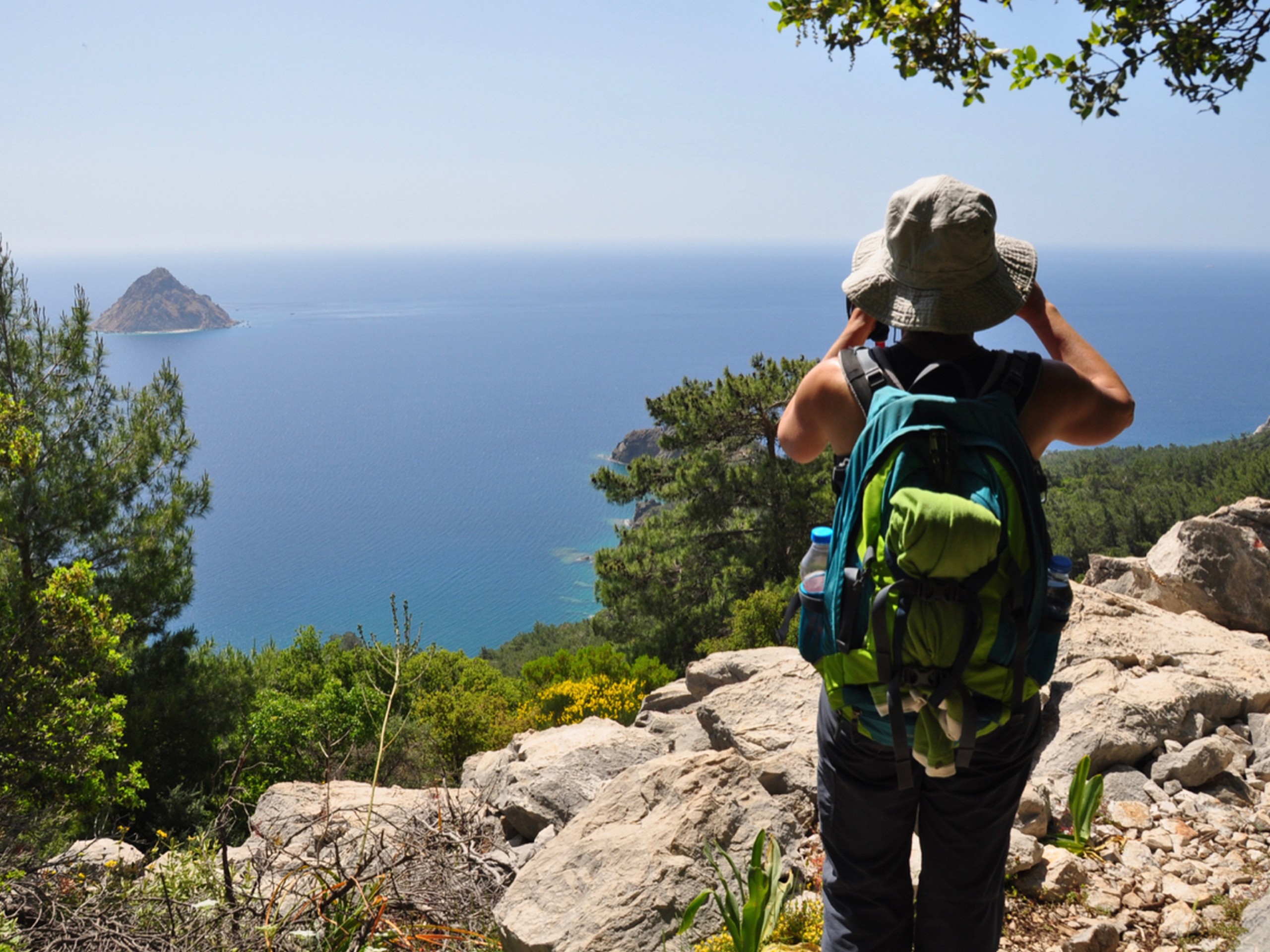 Hiker looking at the sea