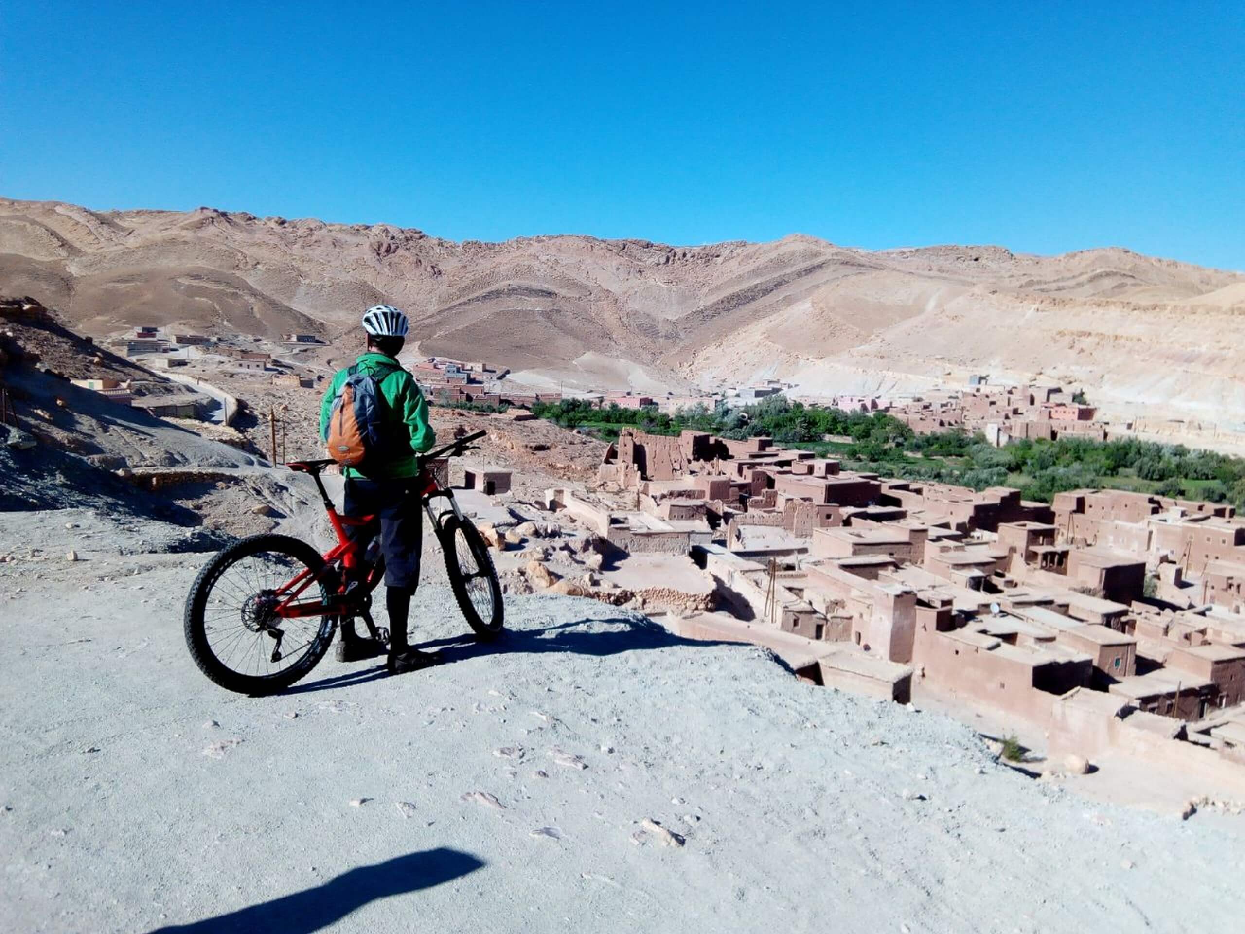 Cyclist looking at the valley in Morocco