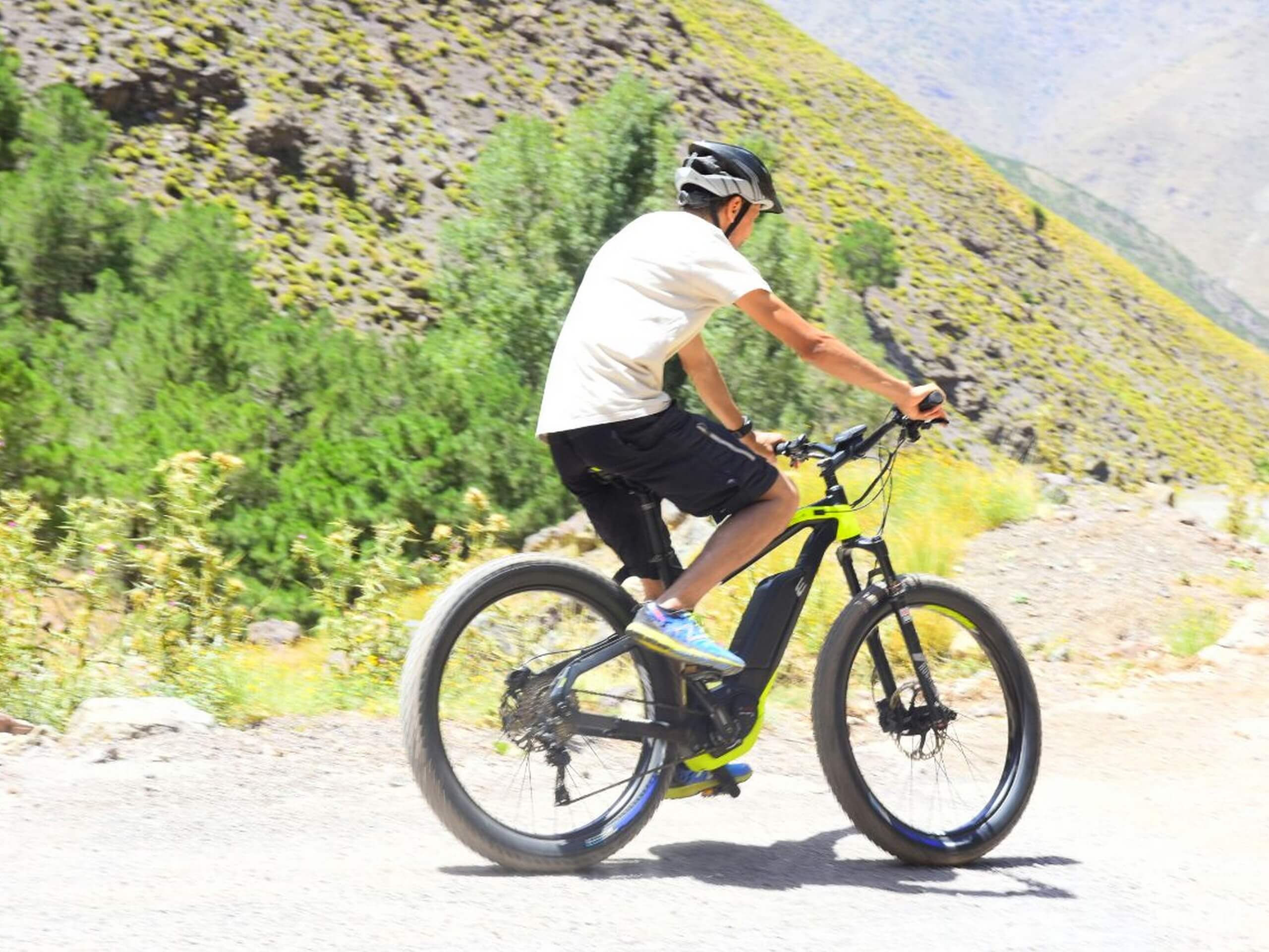 Cyclist on gravel path in Morocco