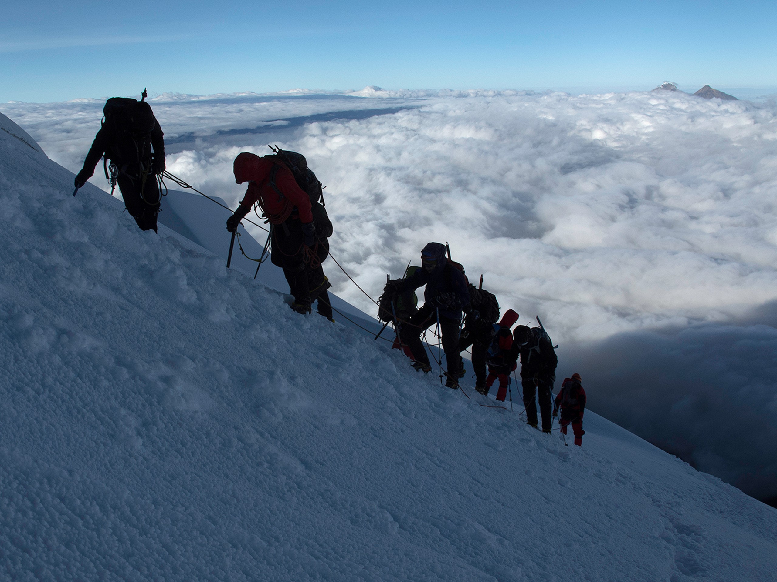 Group of climbers ascending on one of the peaks in Ecuador