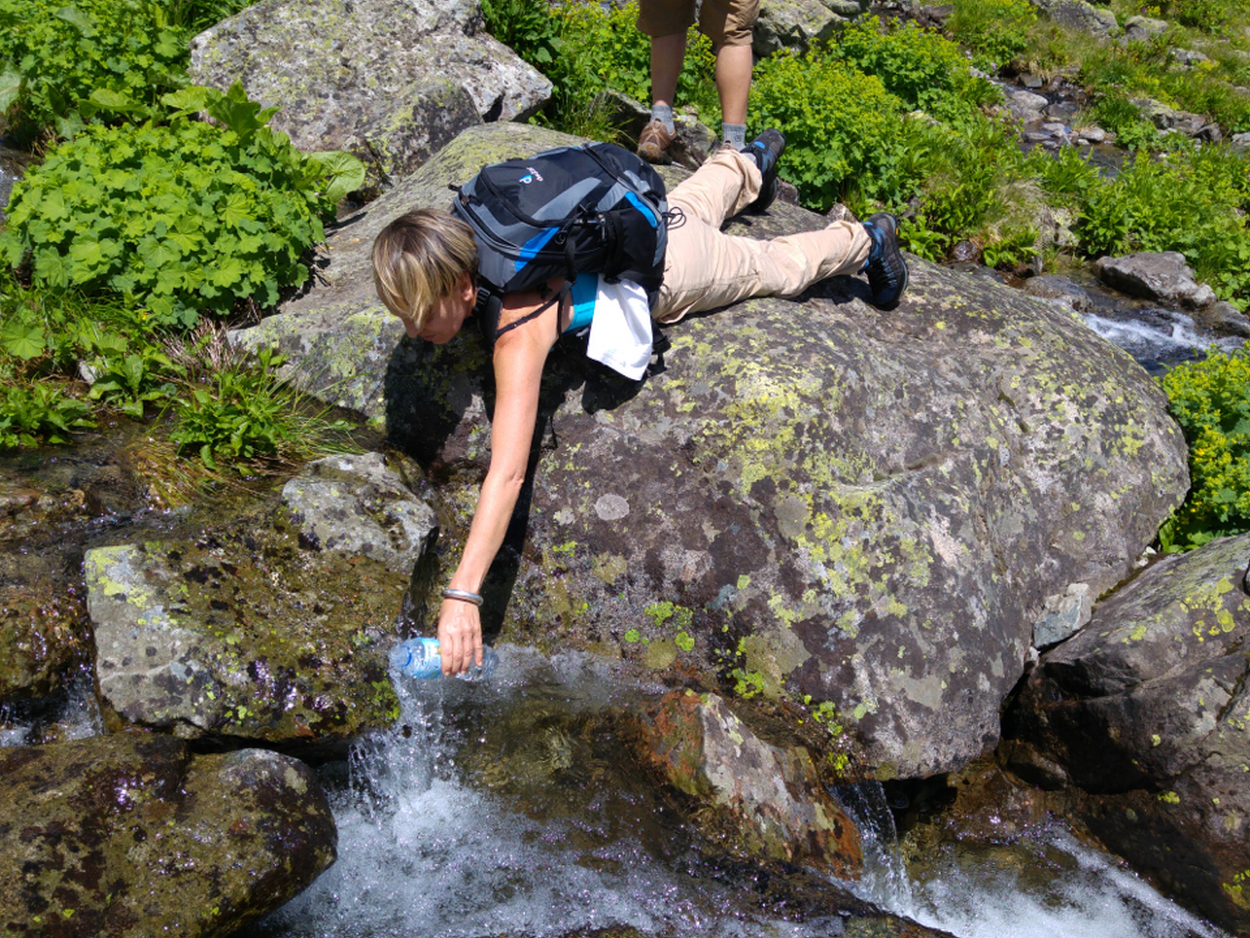 Hiker getting the water from the kreek in Kackar Mountains