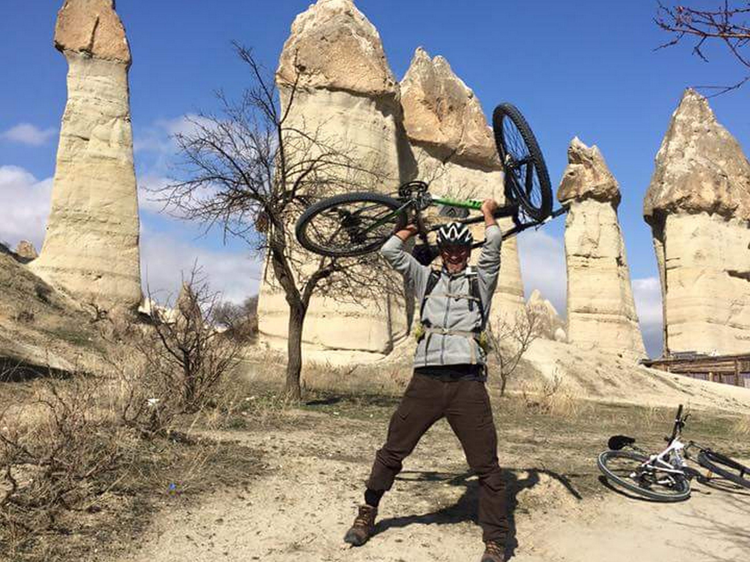 Biker posing with his bike in Cappadocia