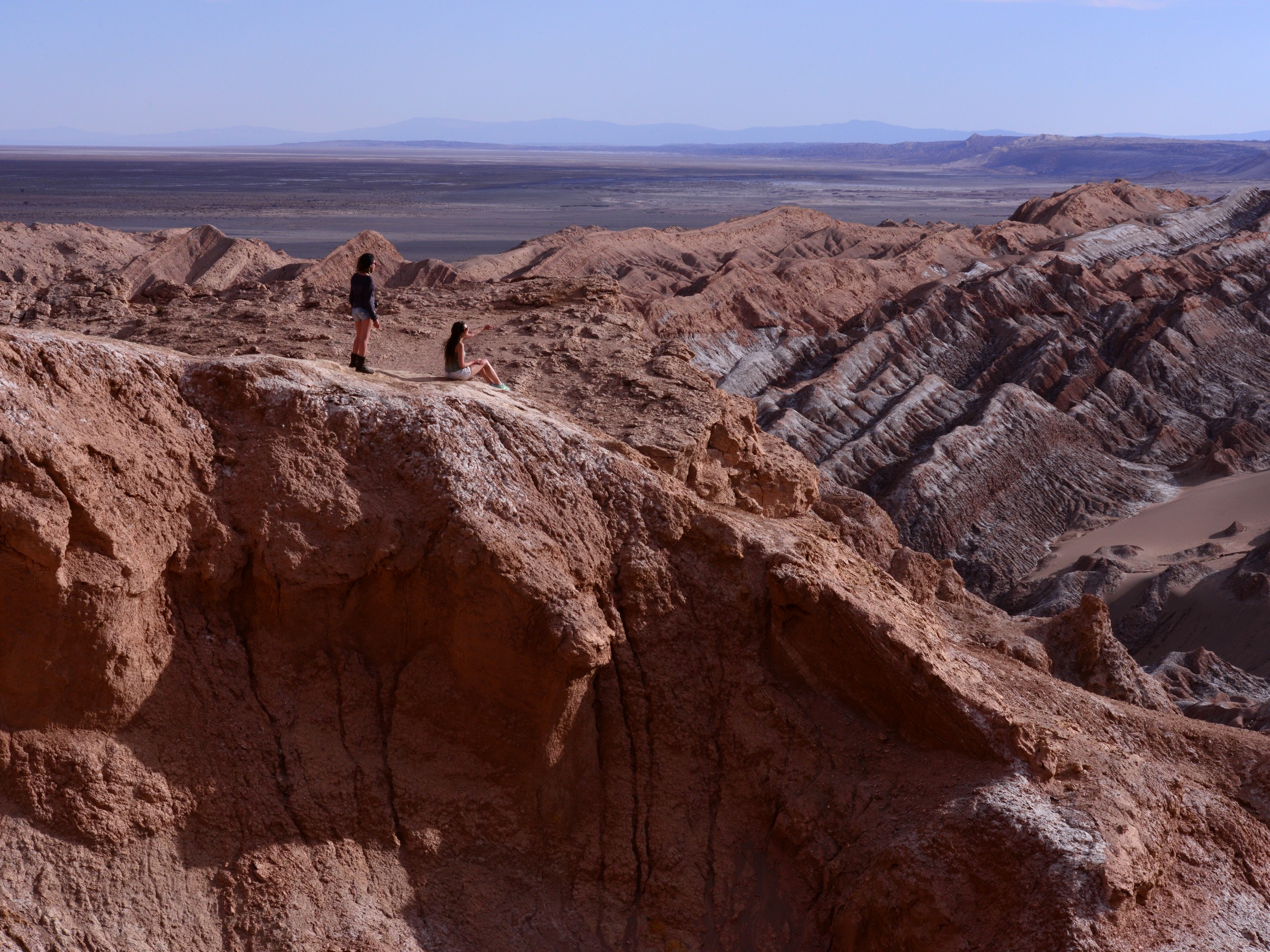 Couple sitting at top of the Moonvalley