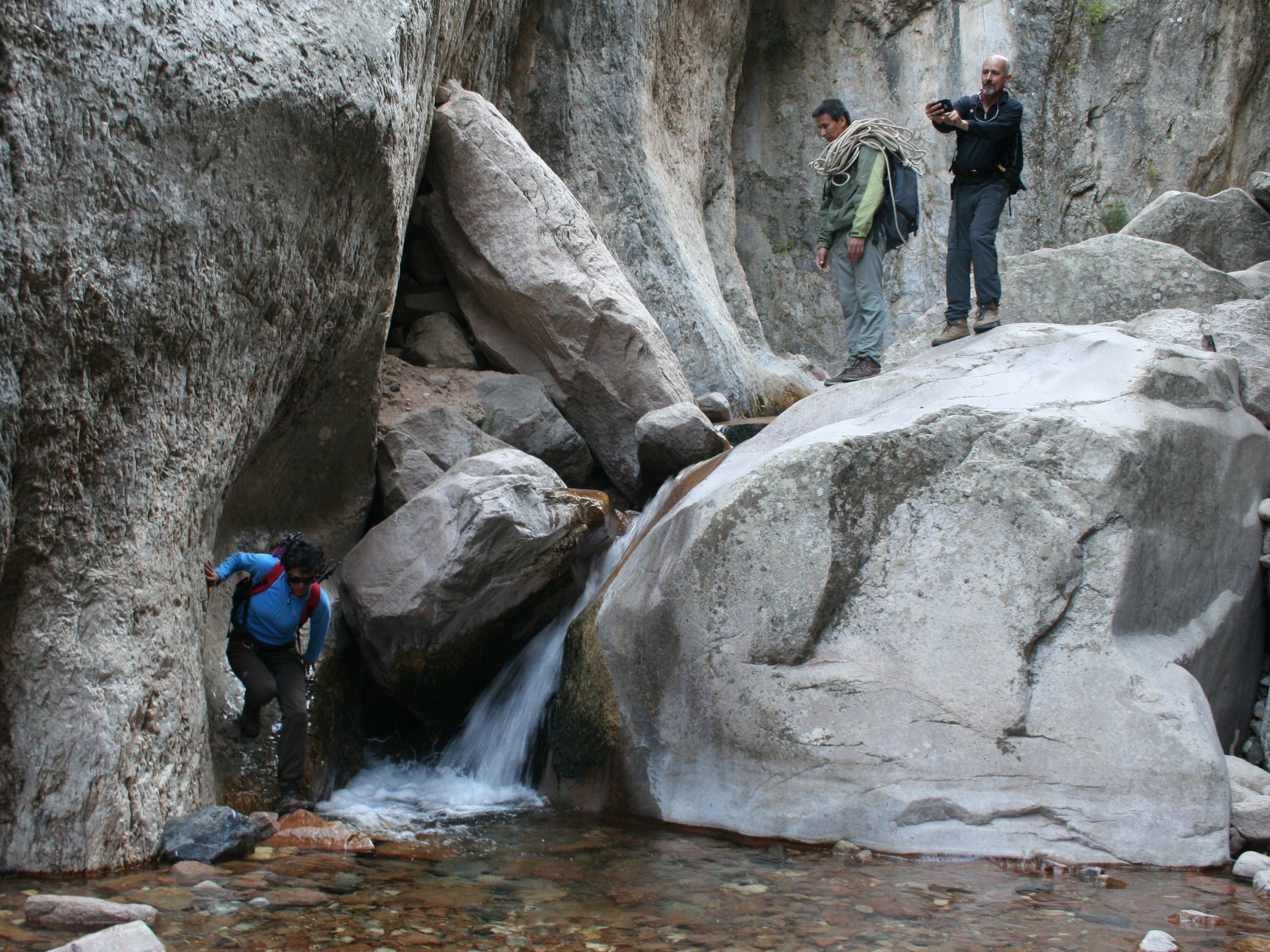 Crossing the small waterfall in Uzbekistan