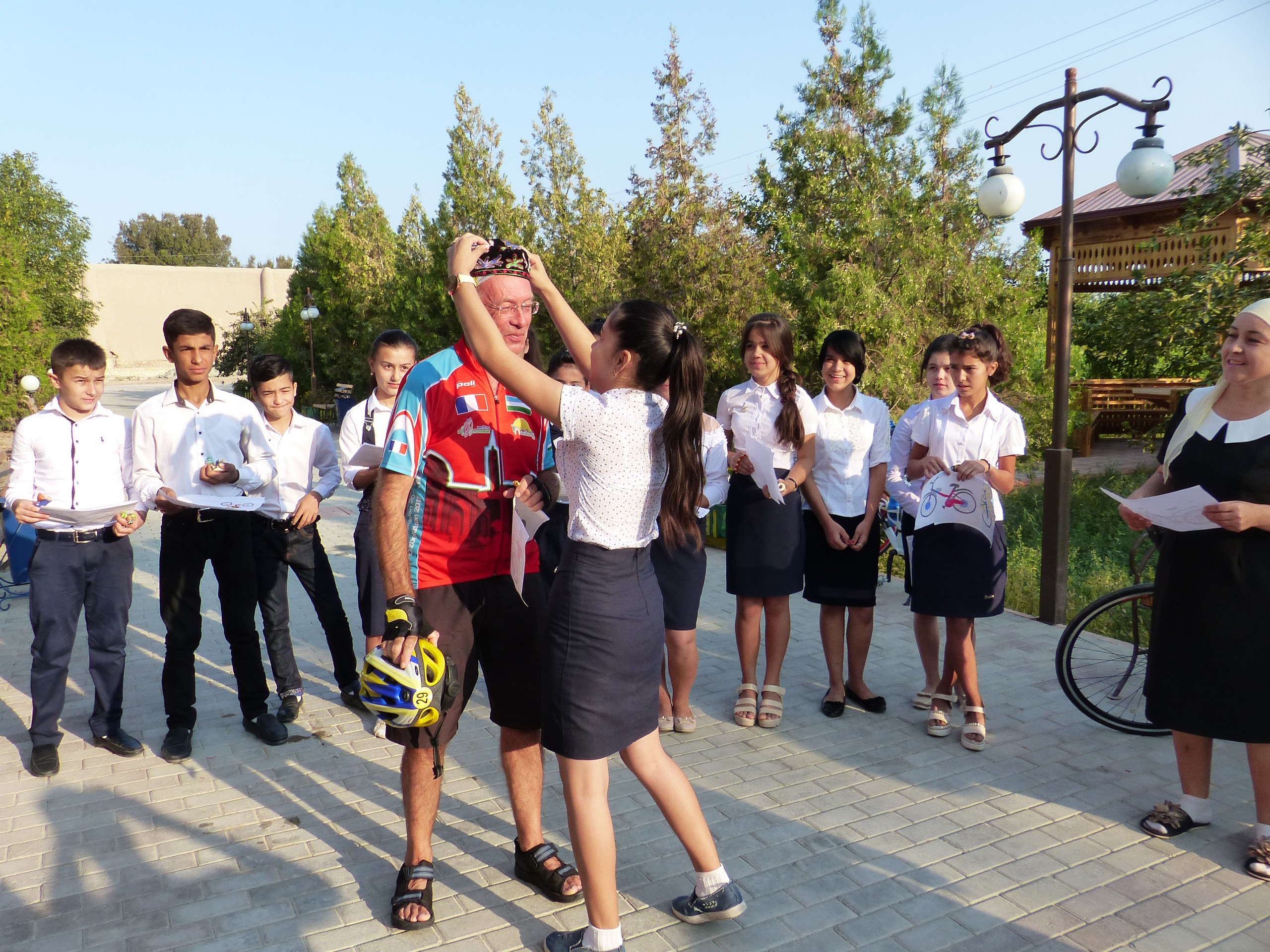 Cyclists engaging in local activities of Uzbekistan