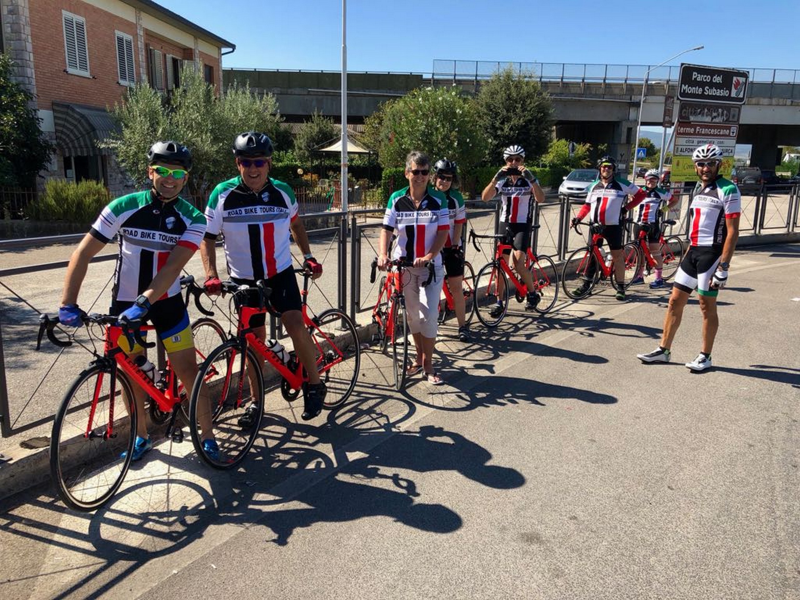 Group of cyclists on guided coast to coast tour in Italy