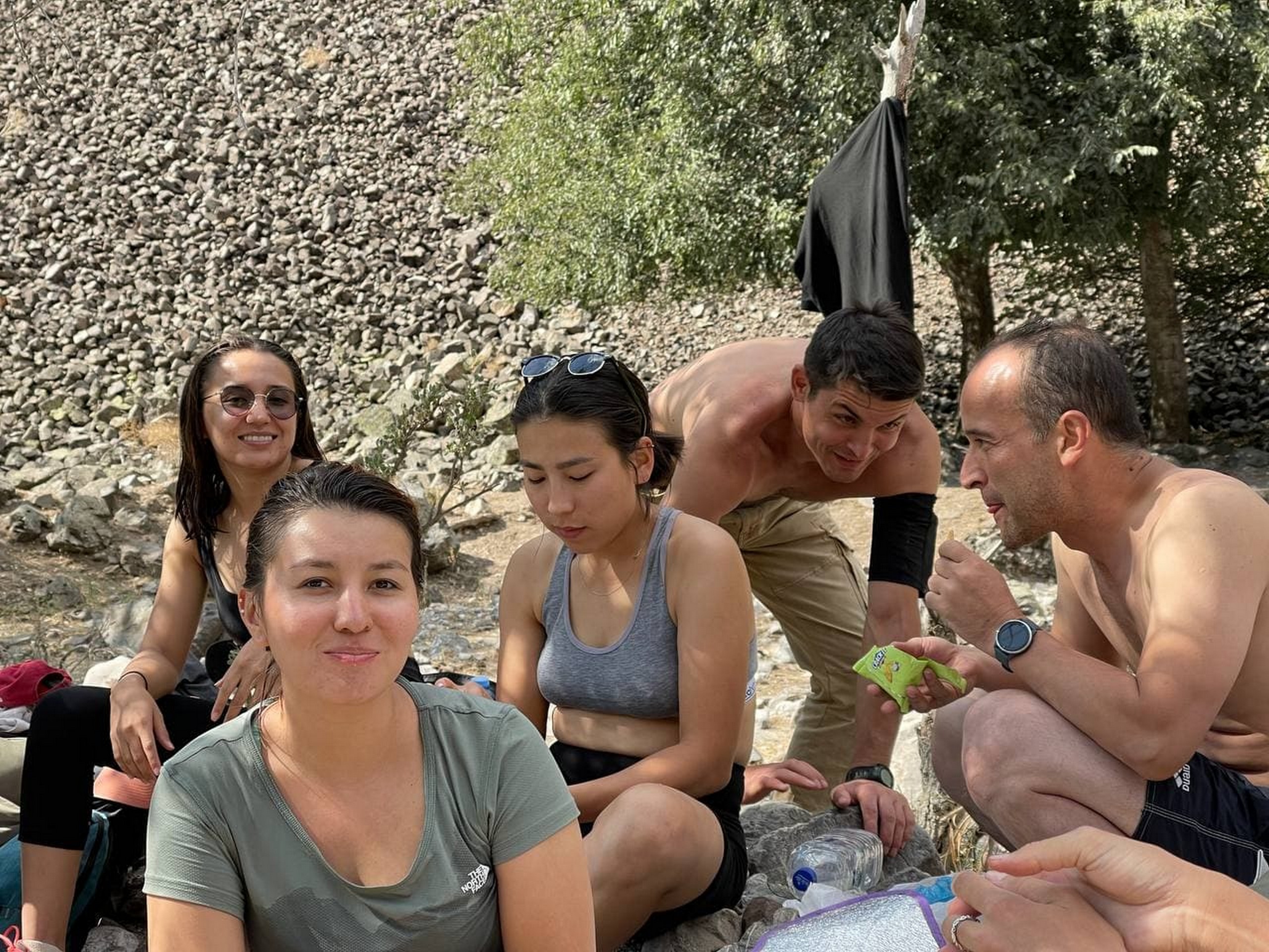 Group of travellers having a break after a bike ride in Uzbekistan