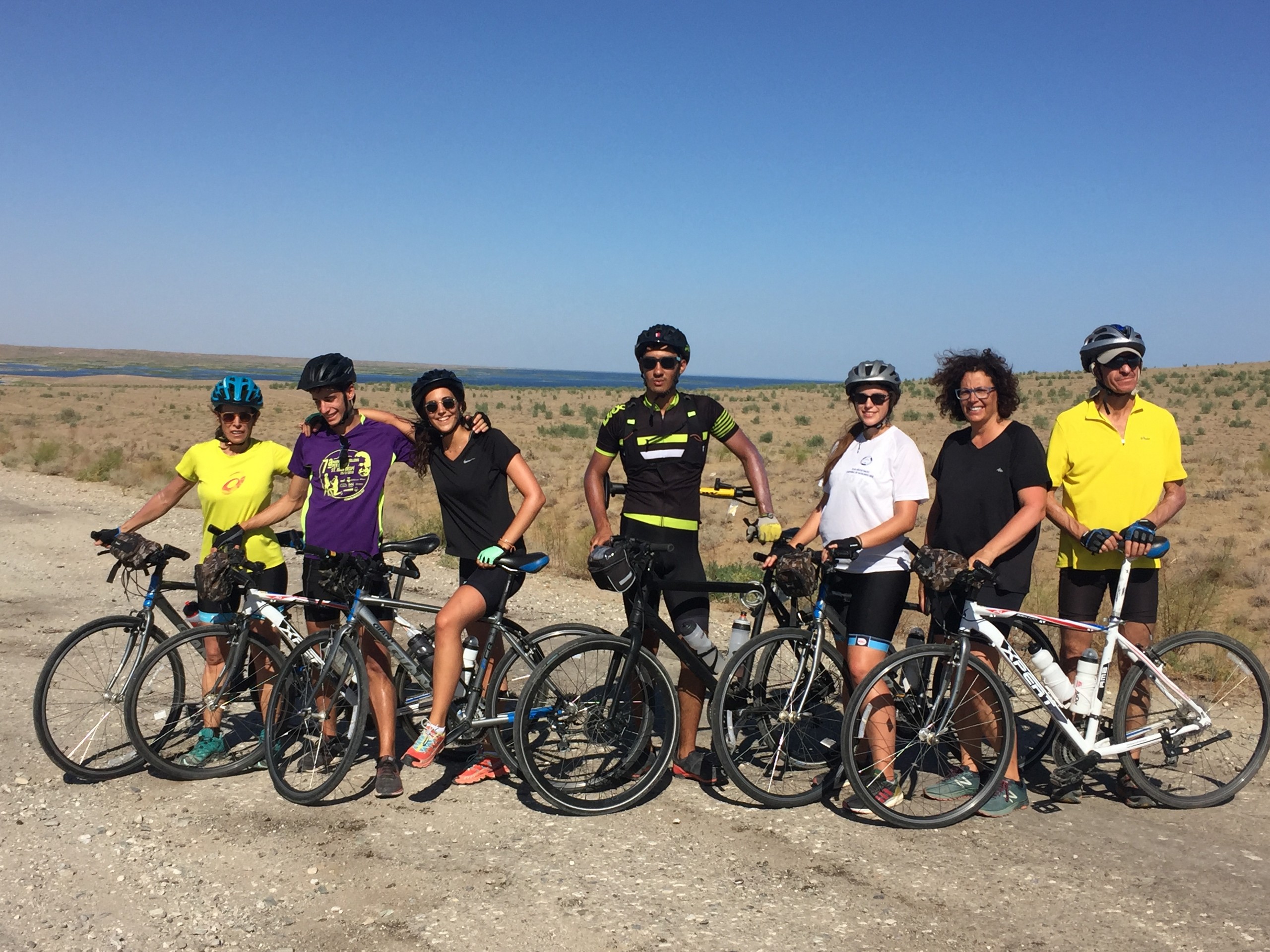 Group of cyclists posing in Uzbekistan