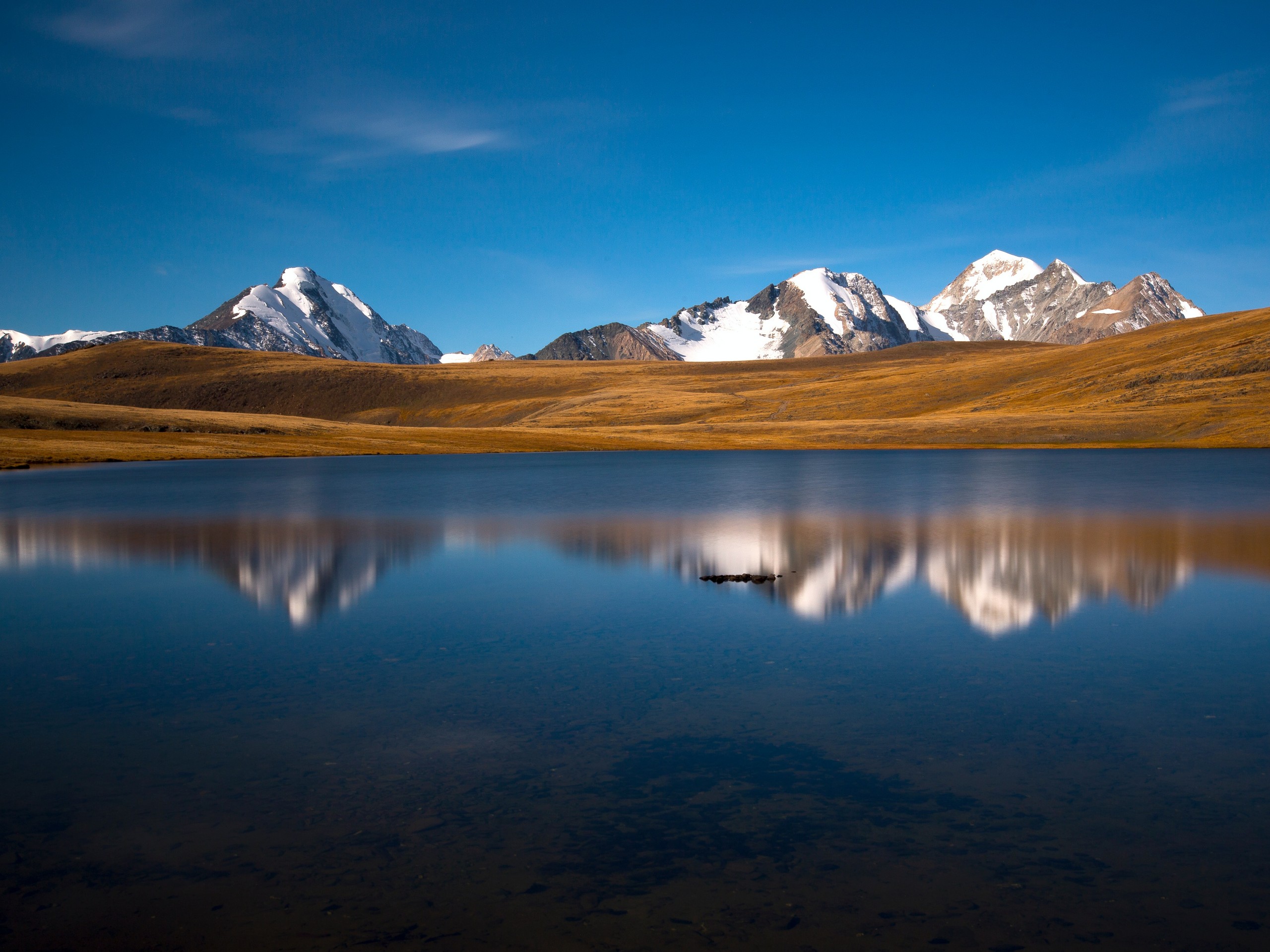 Mountain reflections in the vast Mongolian wilderness