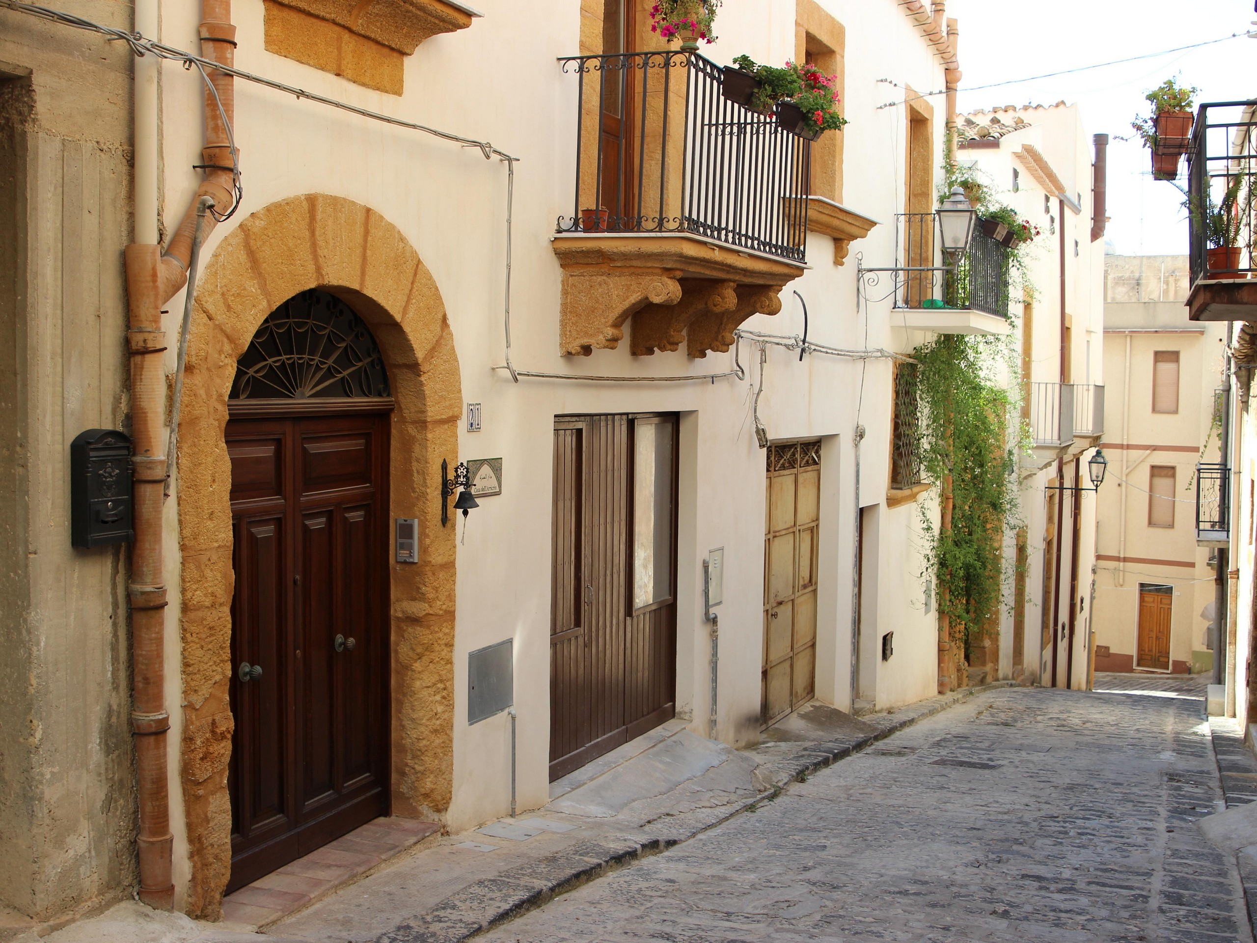 Walking in one of the small cozy streets in Italy