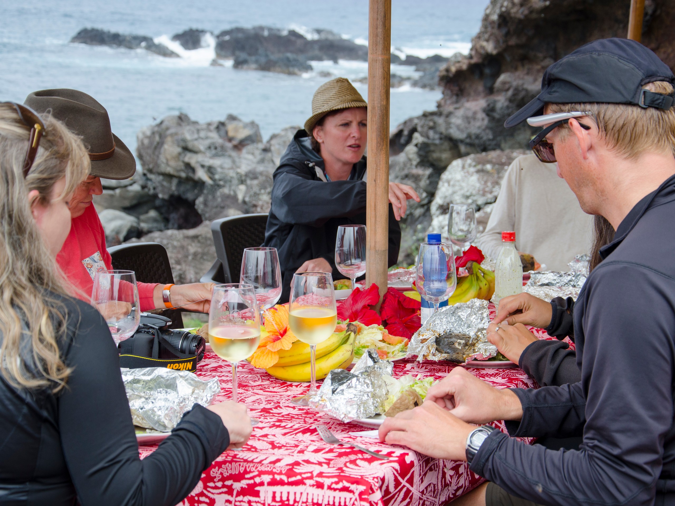 Group of travellers having lunch in Easter Island