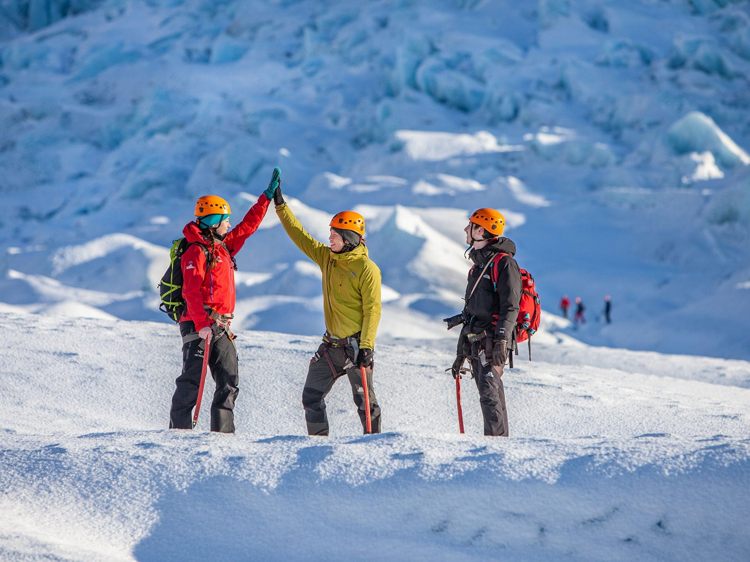 Group of friends hiking in Iceland during the winter - Photo by Bjorgvin Hilmarsson