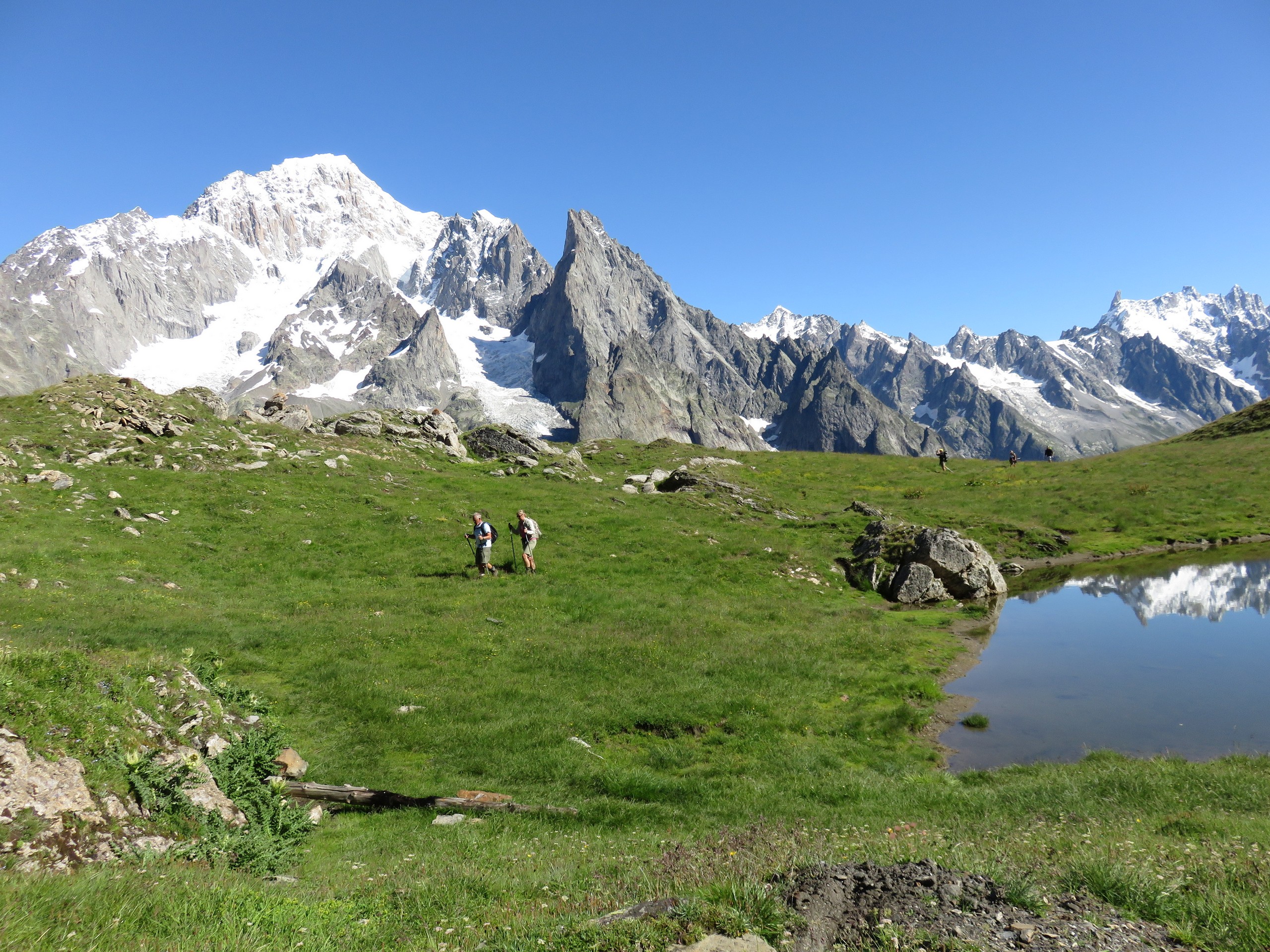 Couple hiking the Tour du Mont Blanc route in the French and Italian Alps