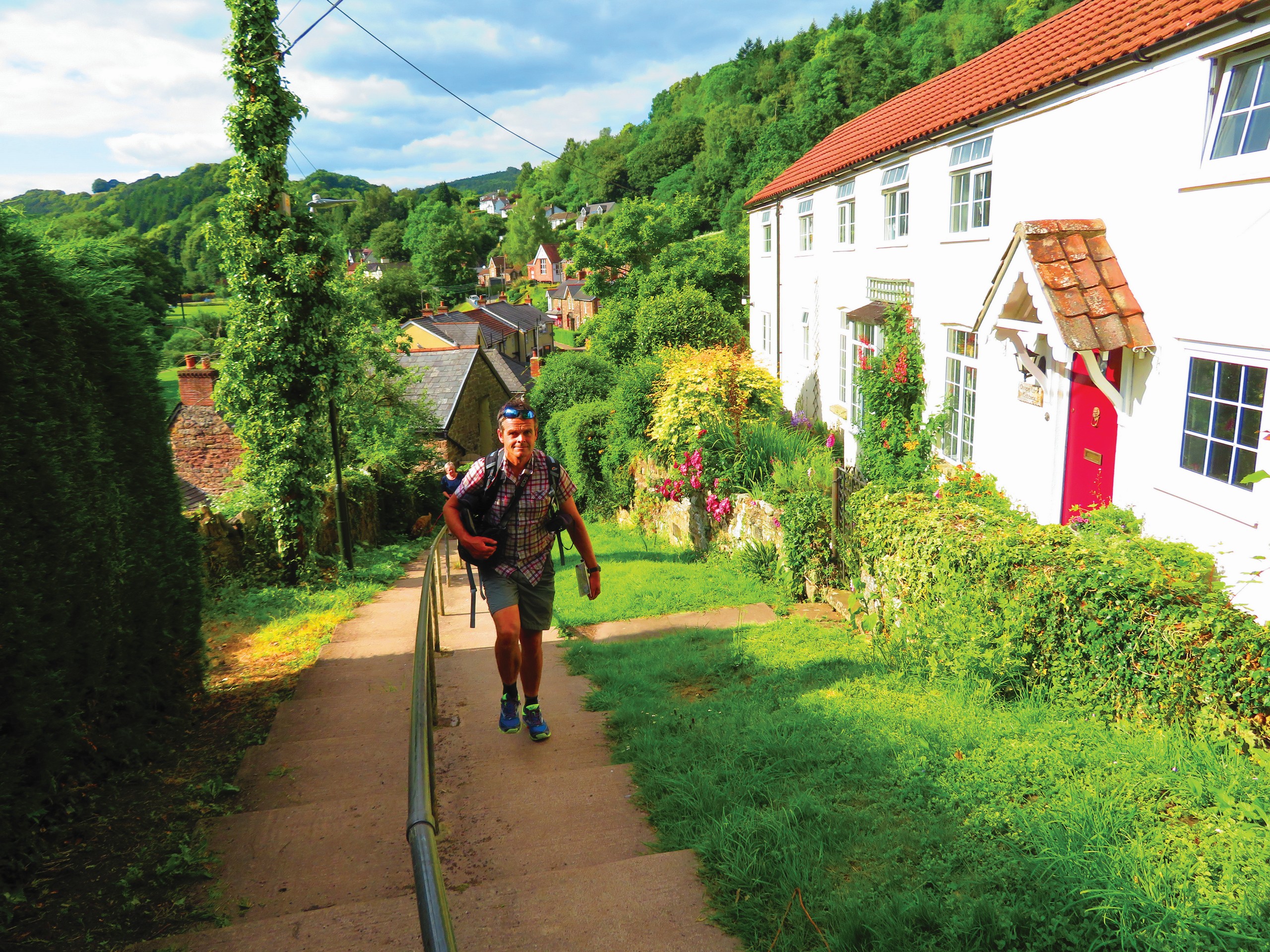 Hiker walking on a path in Wales