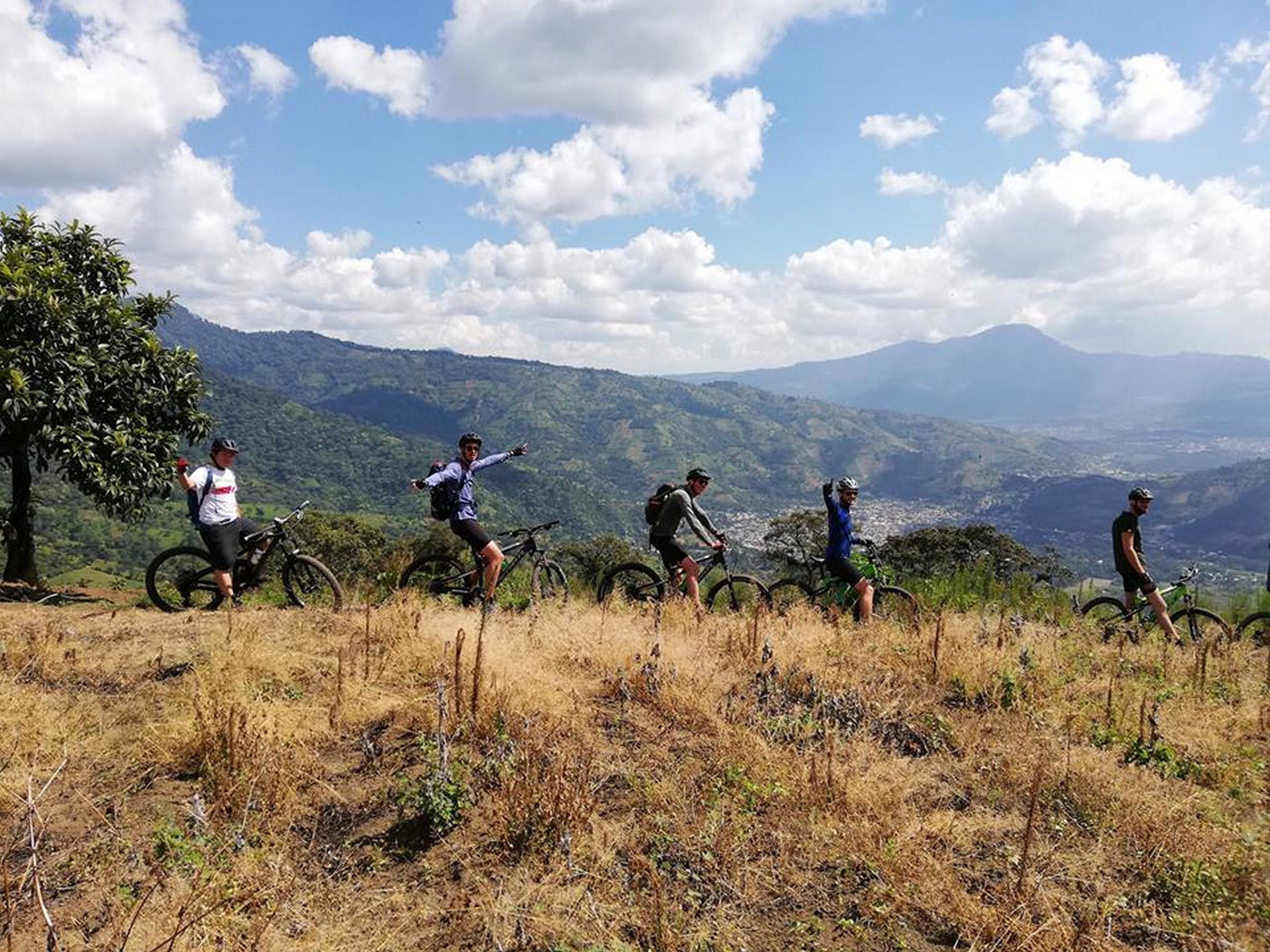 Group biking on the ridge in Guatemala