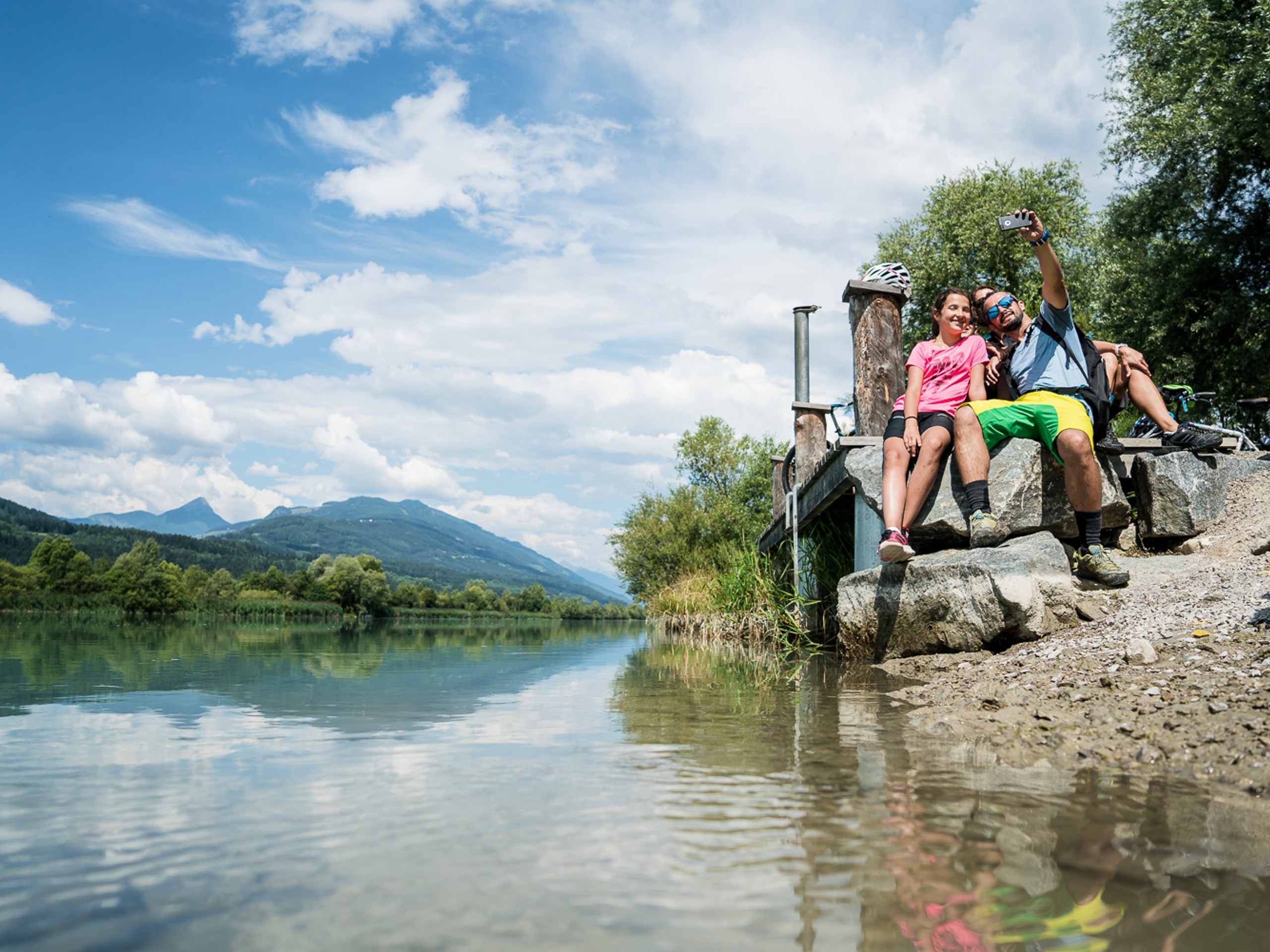 Couple posing near the river