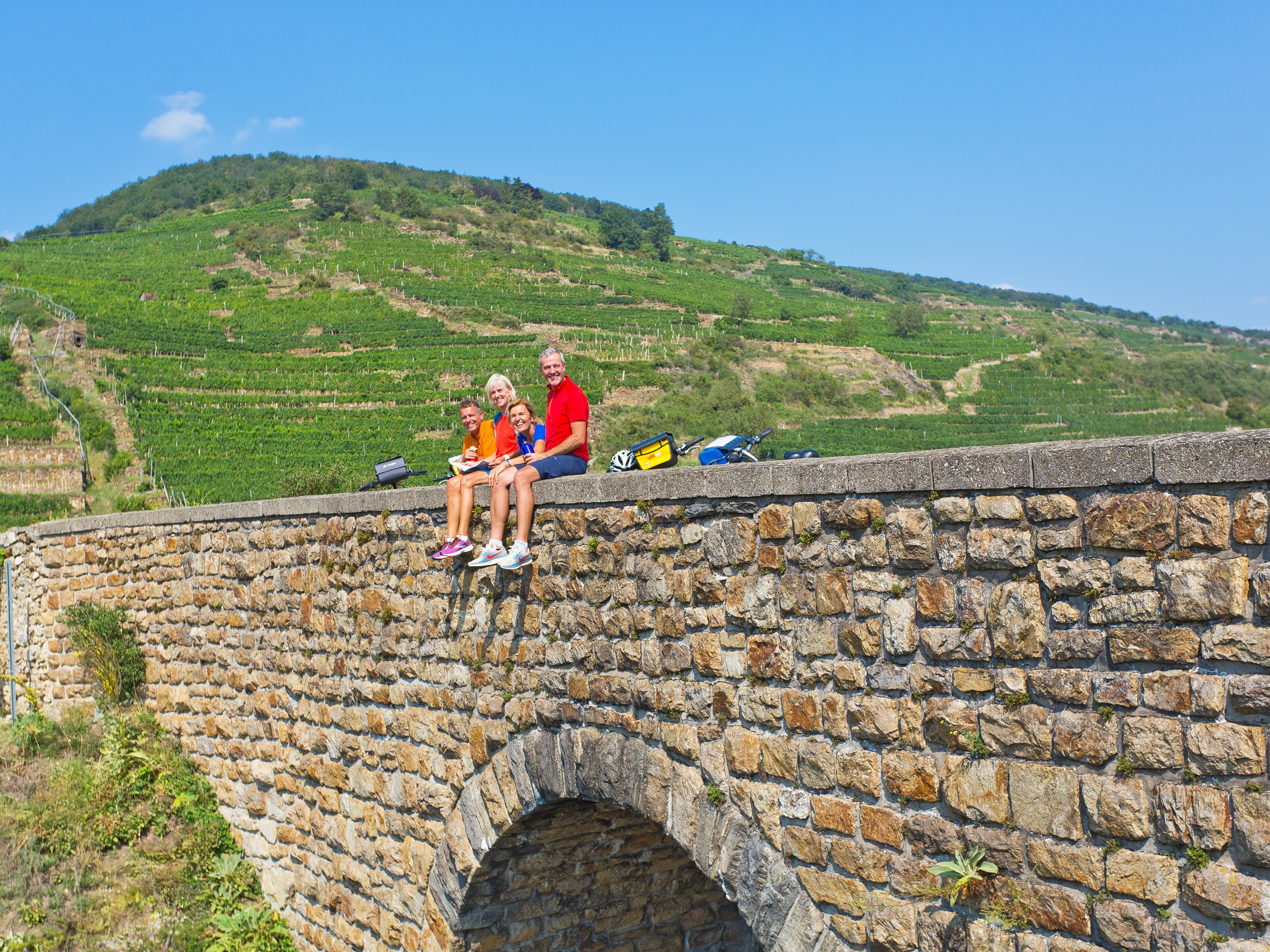 Resting on the rocky bridge while biking in the Rhine region