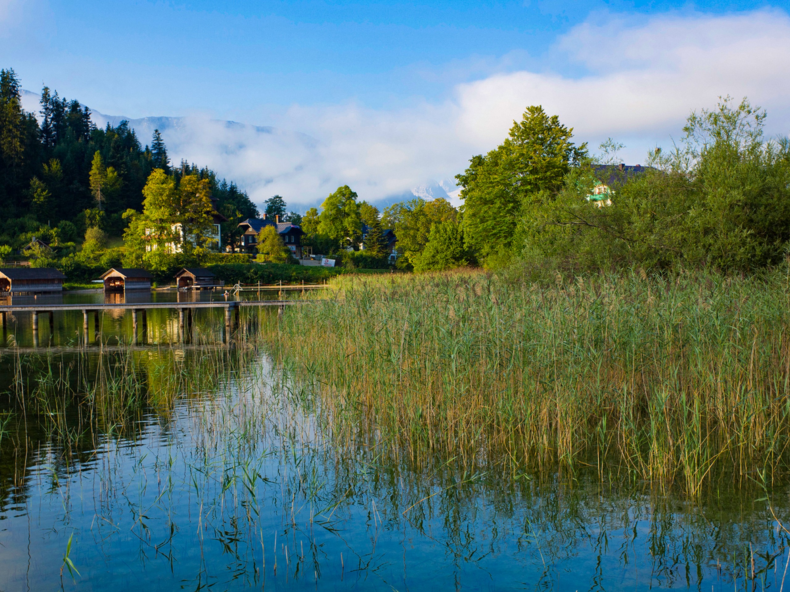 Passing by the small lake in Salzkammergut while on a self-guided trip