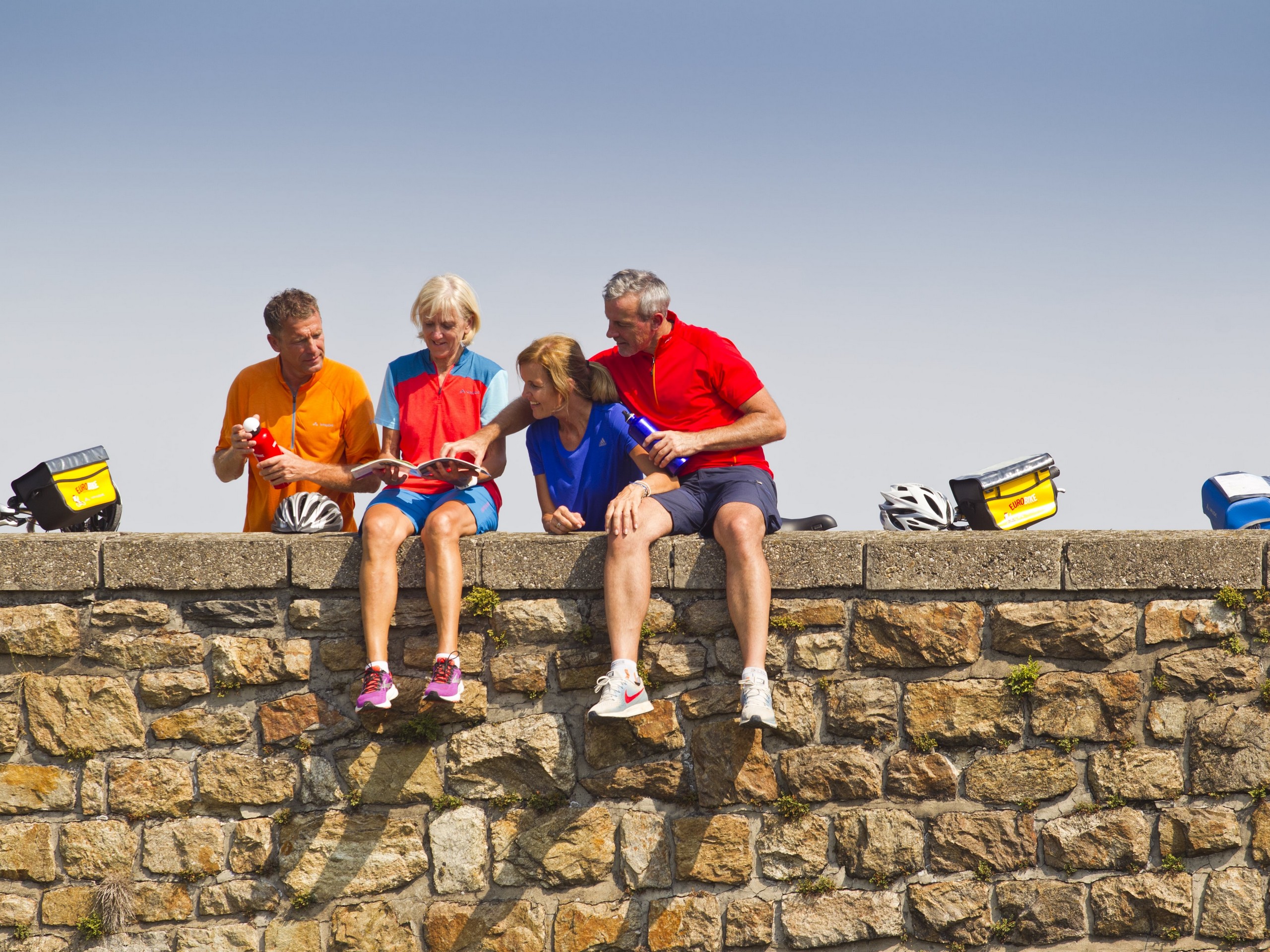 Posing on a wall while biking along the Danube path