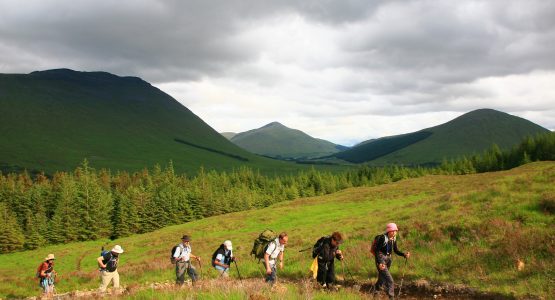 Walking up Mam Carraigh (c)John Millen