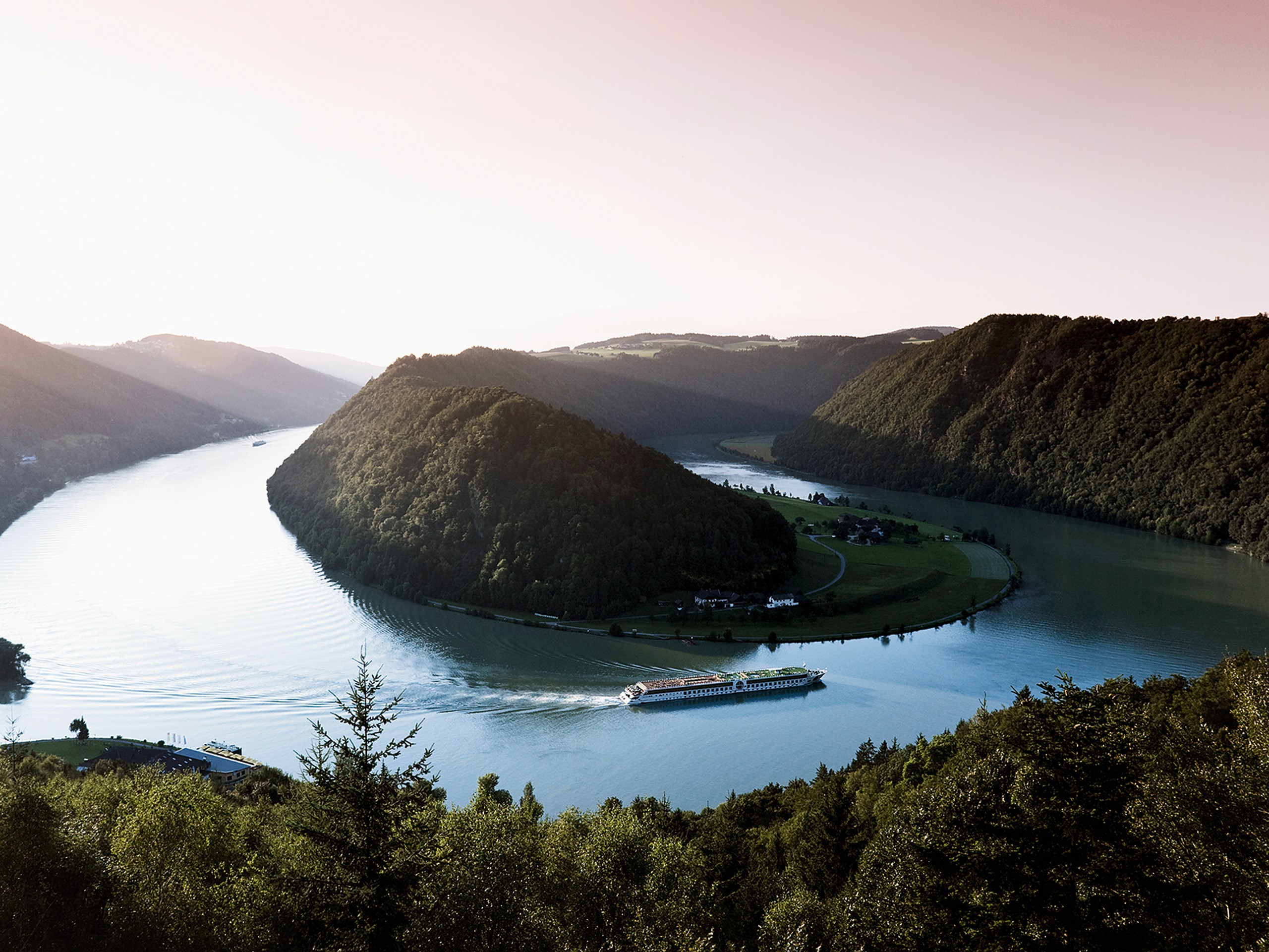 Cruise ship on the Danube river as seen from the above