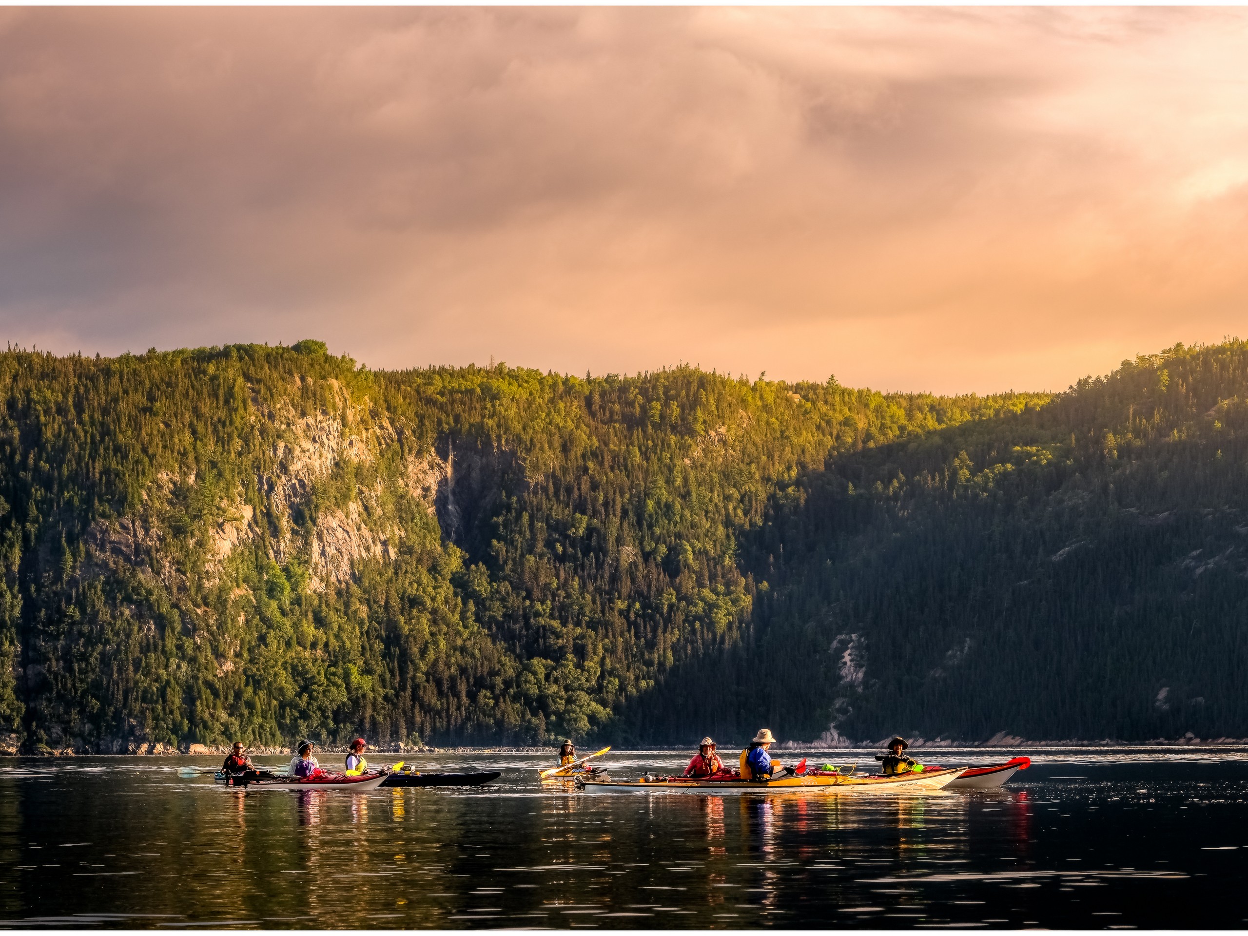 Group of friends kayaking in Quebec