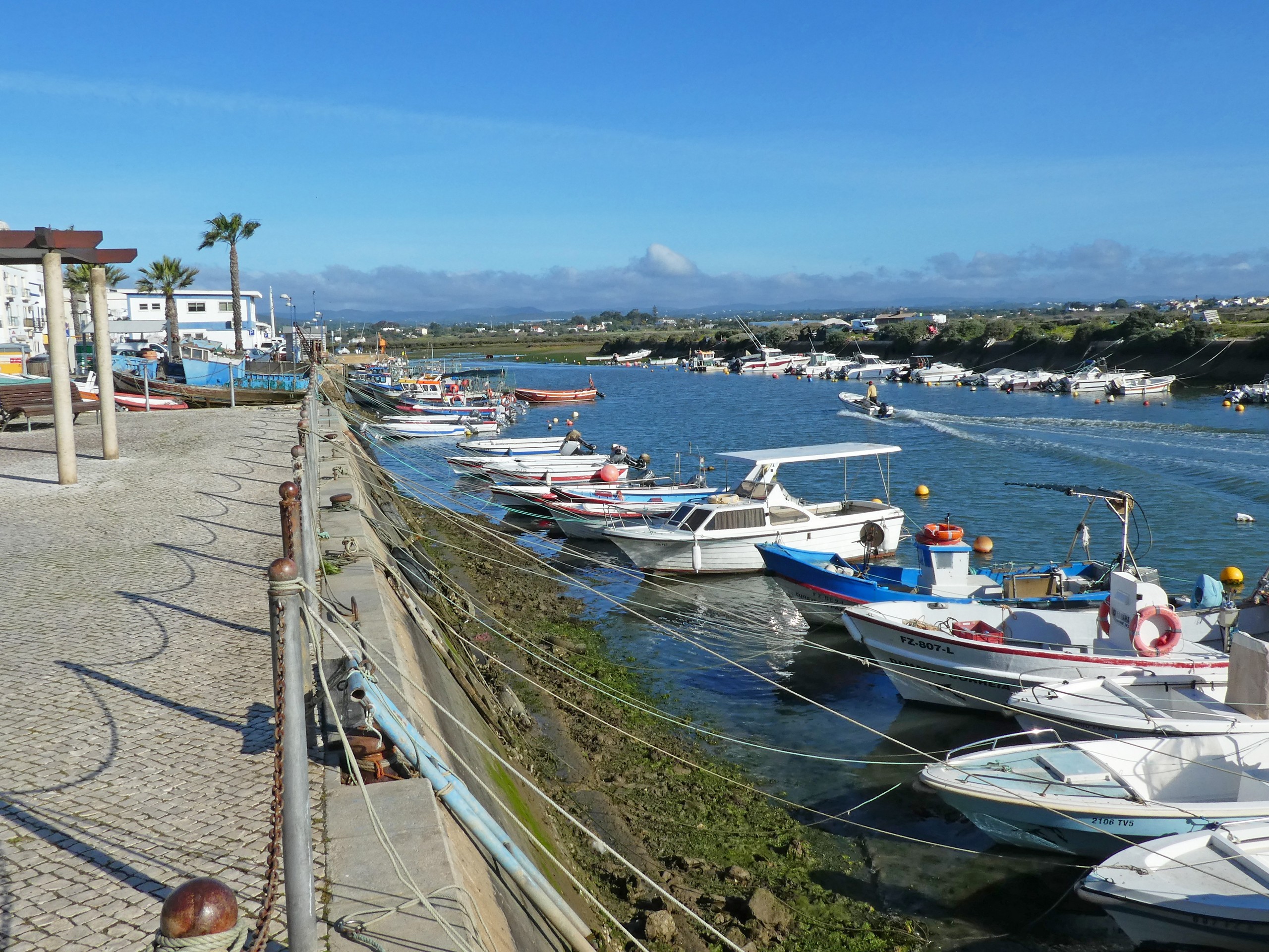 Walking along the marina in Algarve