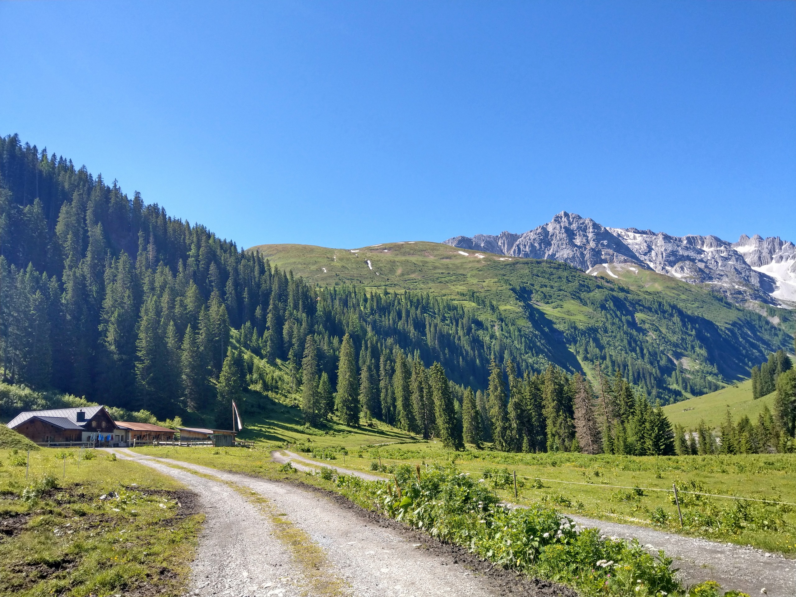 Approaching one of the mountain huts along the E5 Route