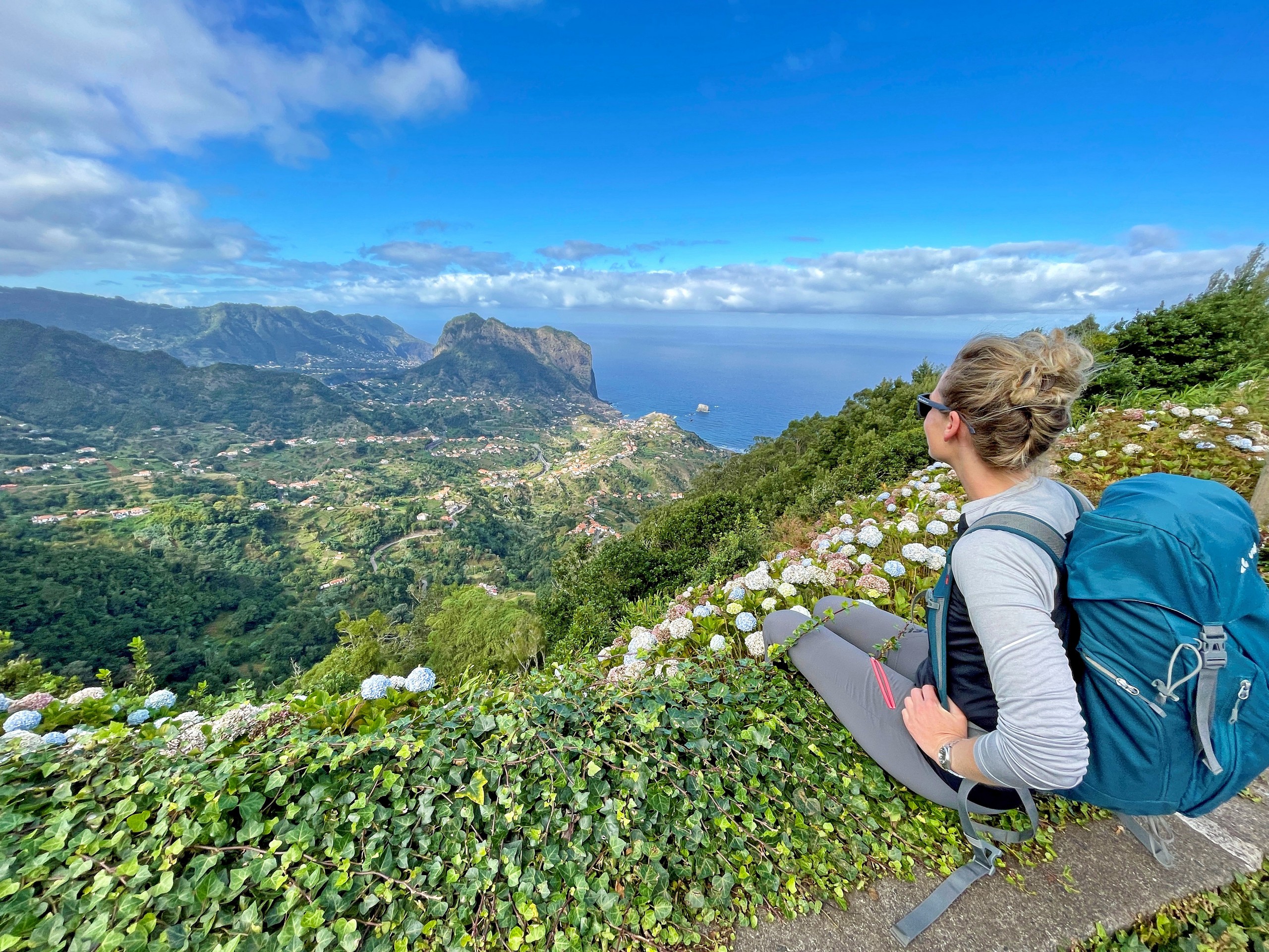 Hiker looking down to the shores of Madeira