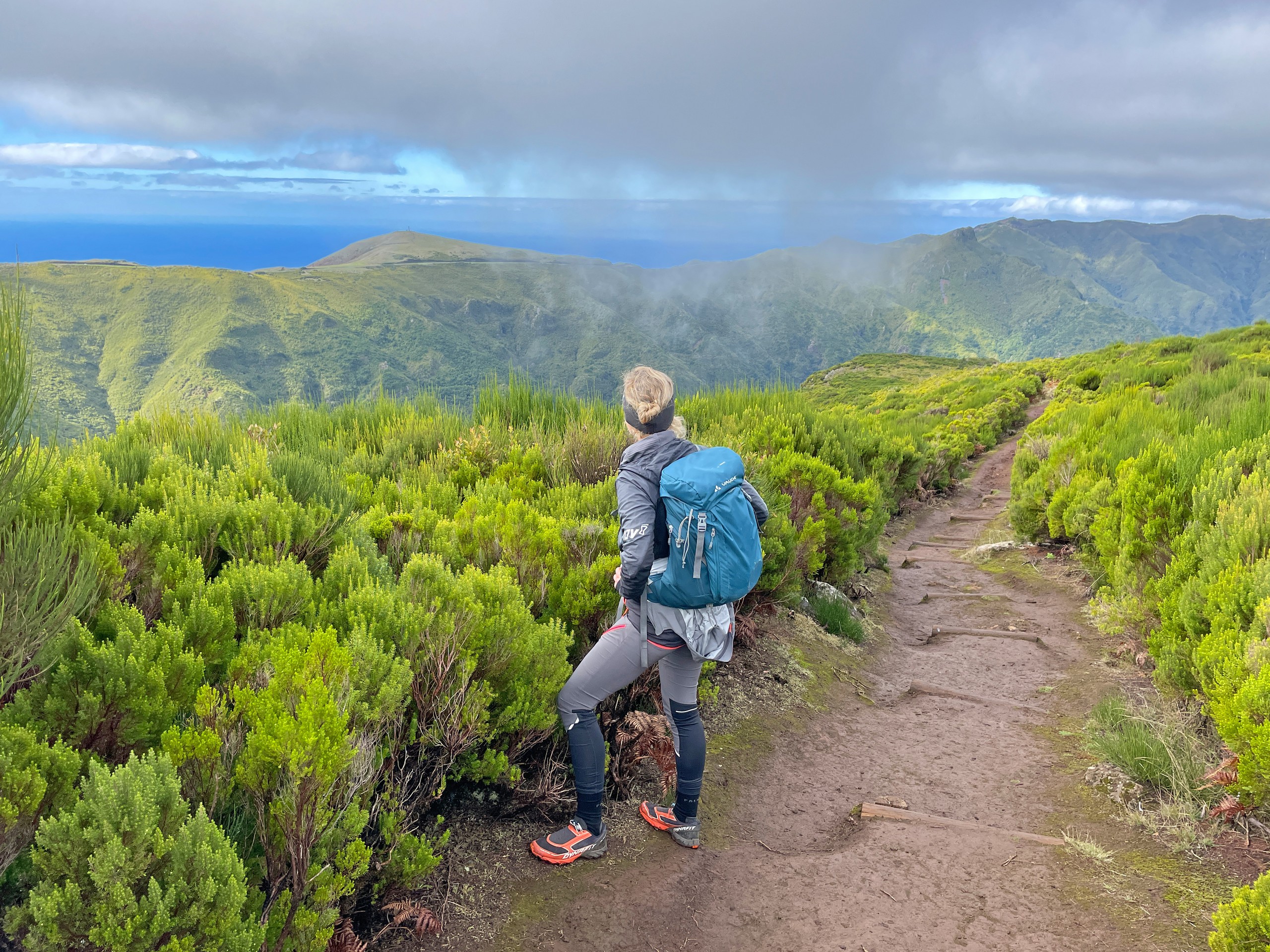 Hiker walking on a path in Madeira Island