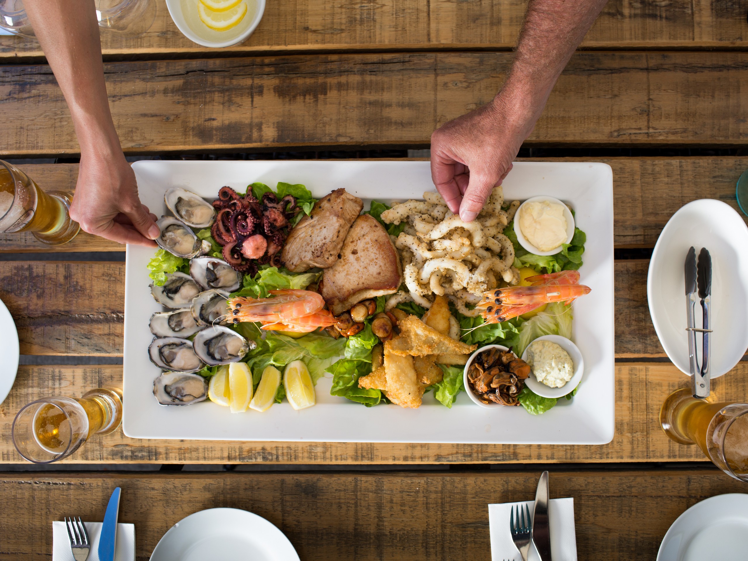 Tasting the seafood while on a guided tour