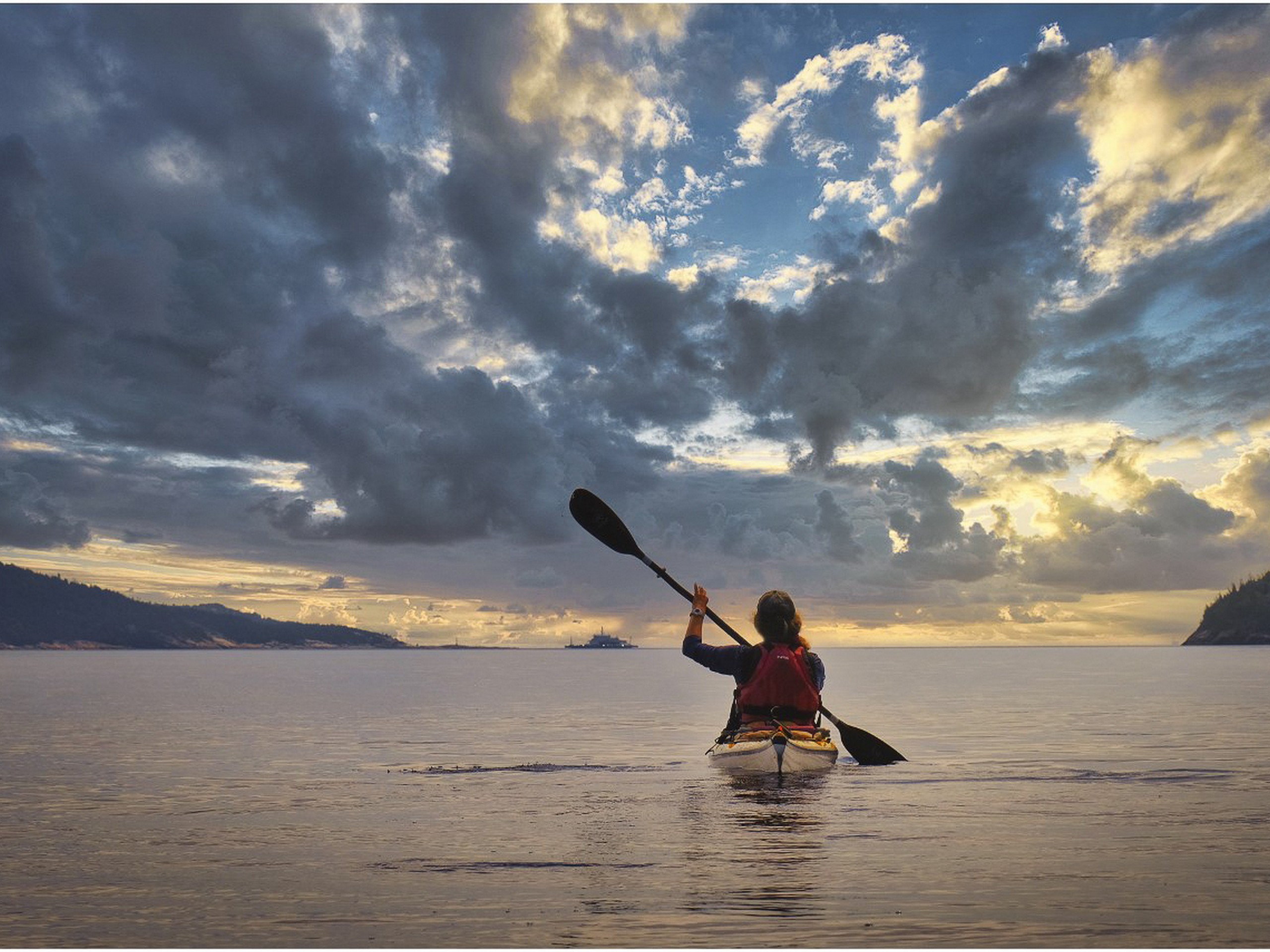 Kayaker In Quebec During The Sunset