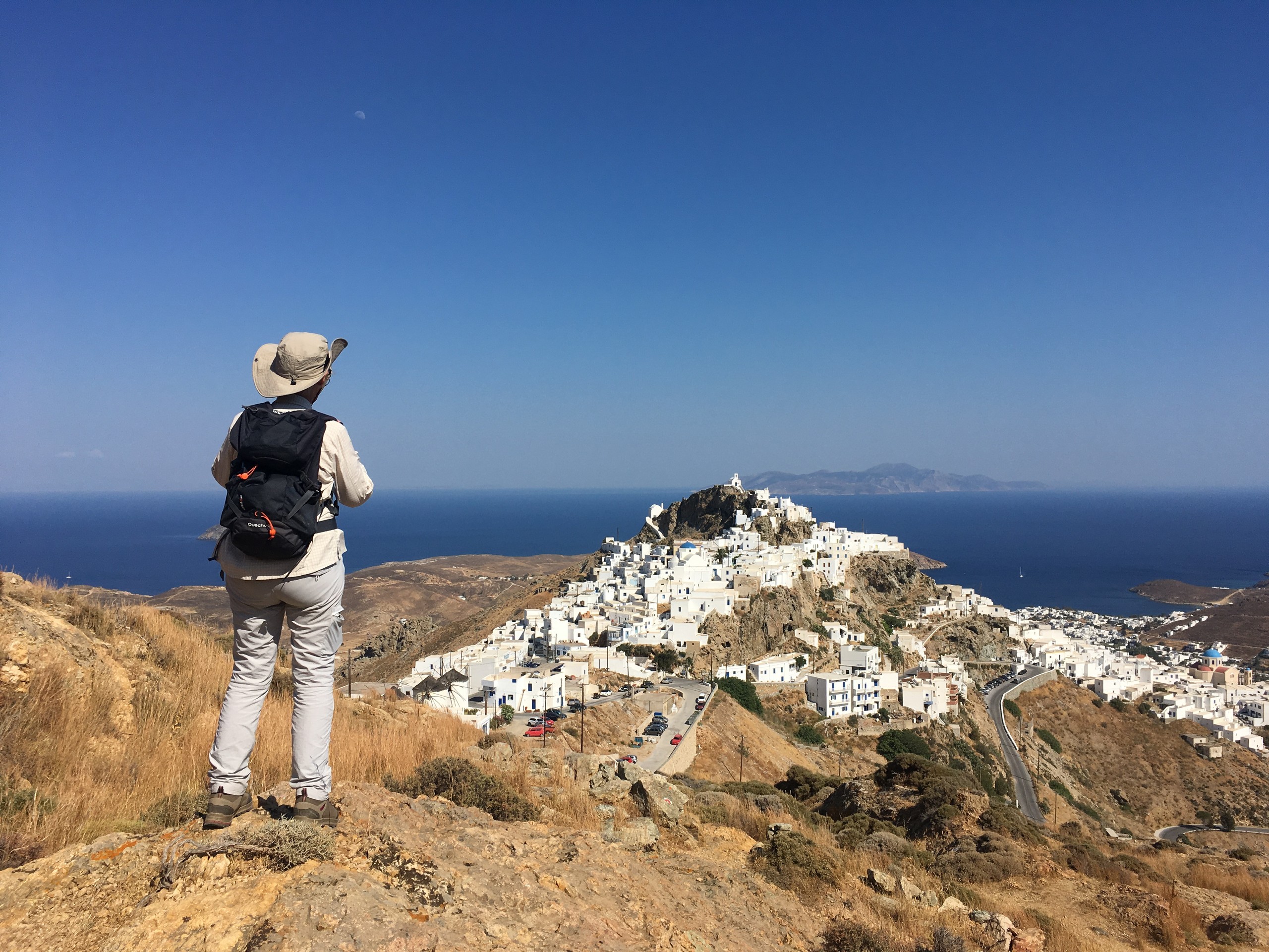 Hiker in front of Chora, the main Serifos village