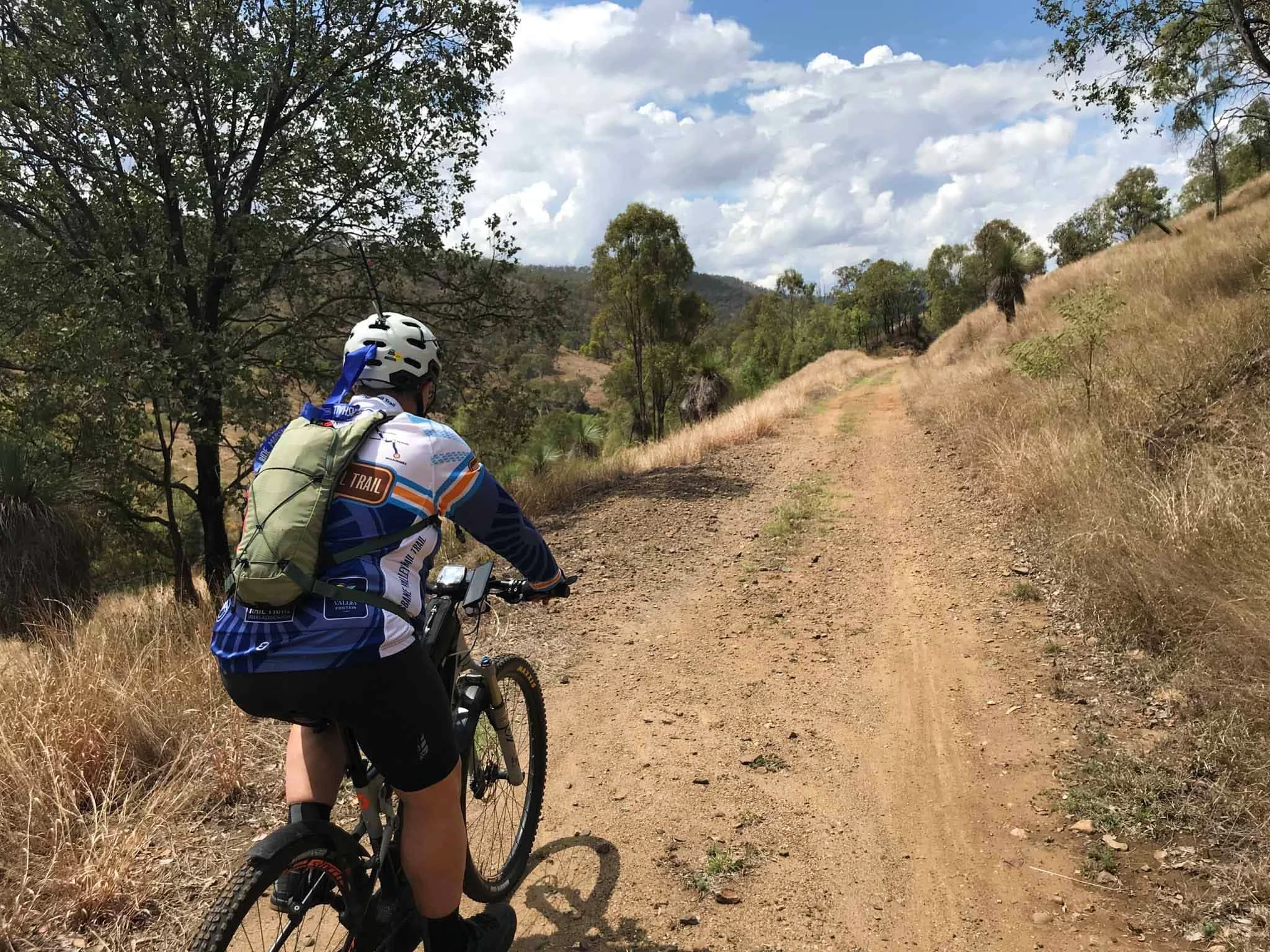 Cyclist riding the decomissioned railroad in Queensland