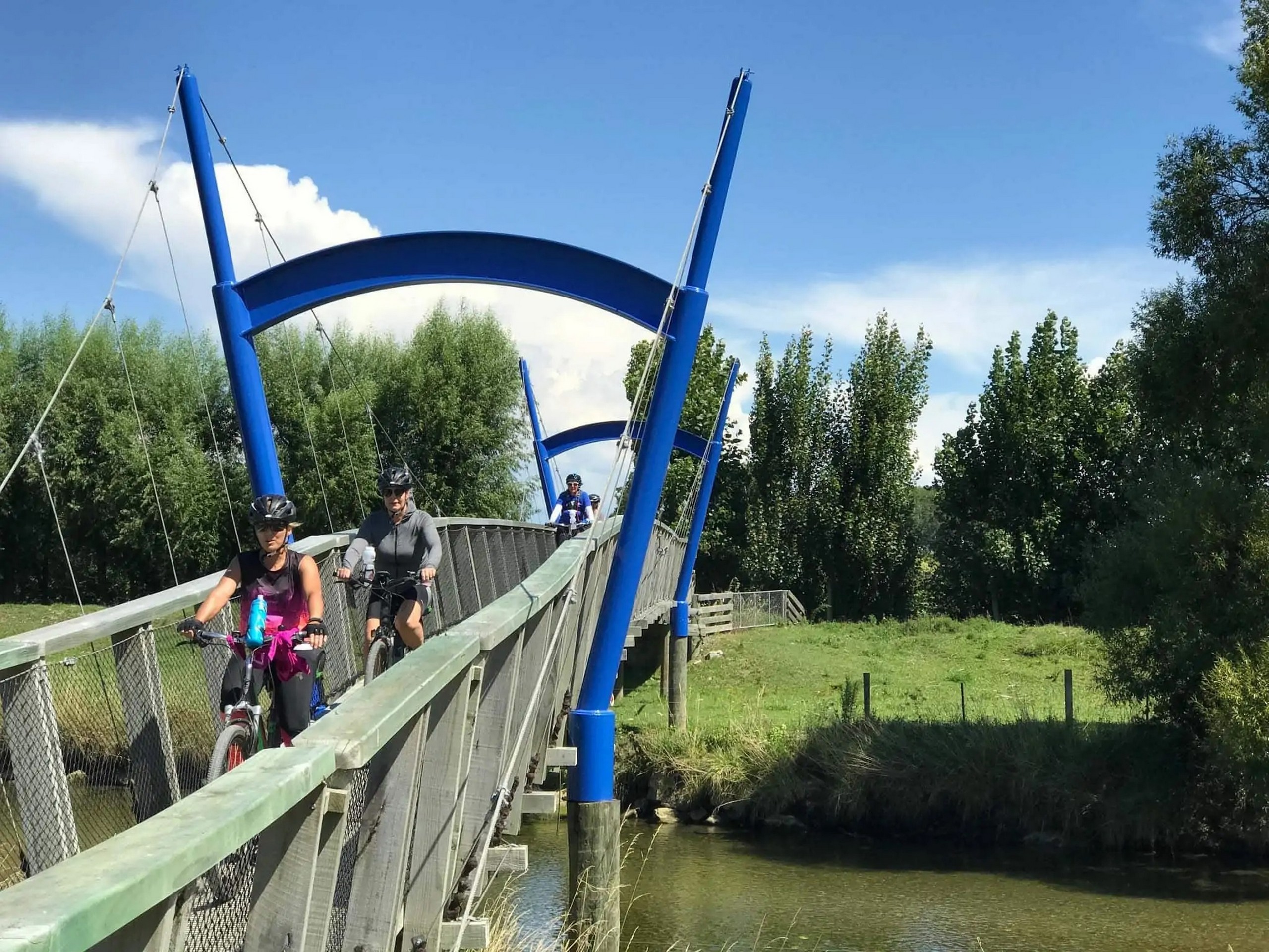 Crossing the small pedestrian bridge by bike