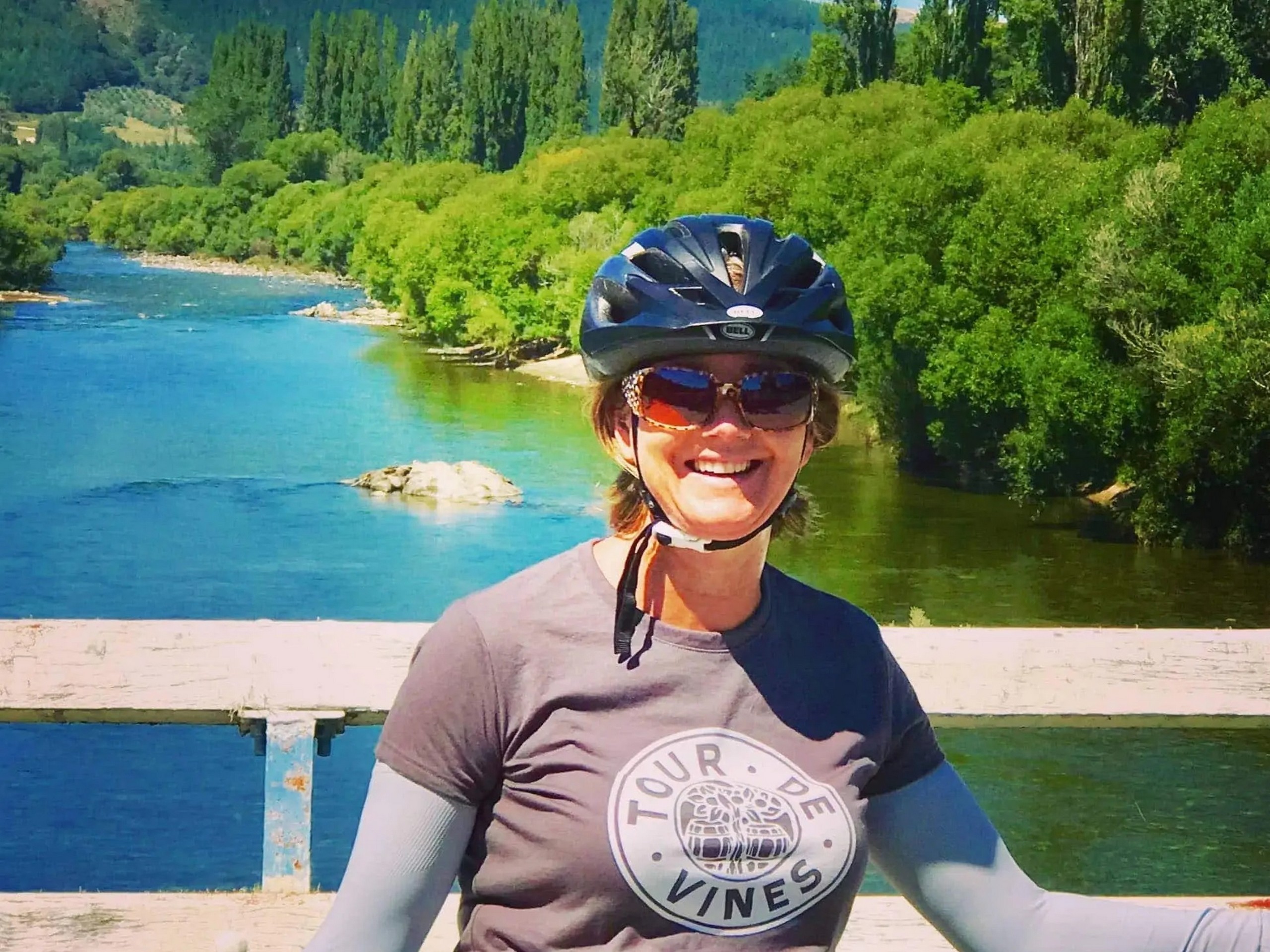 Cyclist posing on the bridge in New Zealand